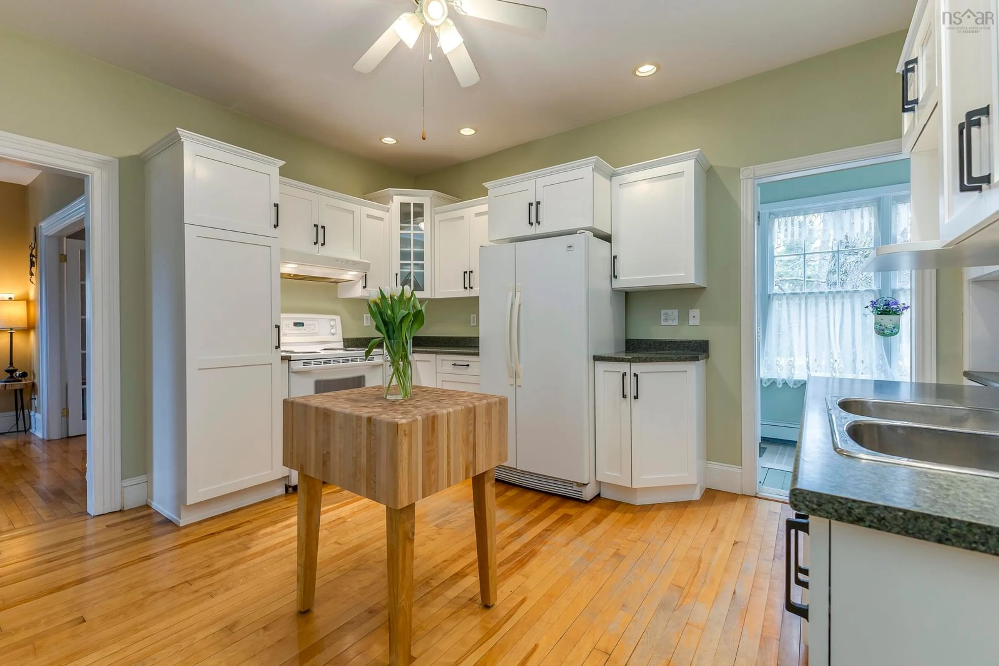 Open concept kitchen, wood/laminate floor for 1273 North Main St, Westville Nova Scotia B0K 2A0