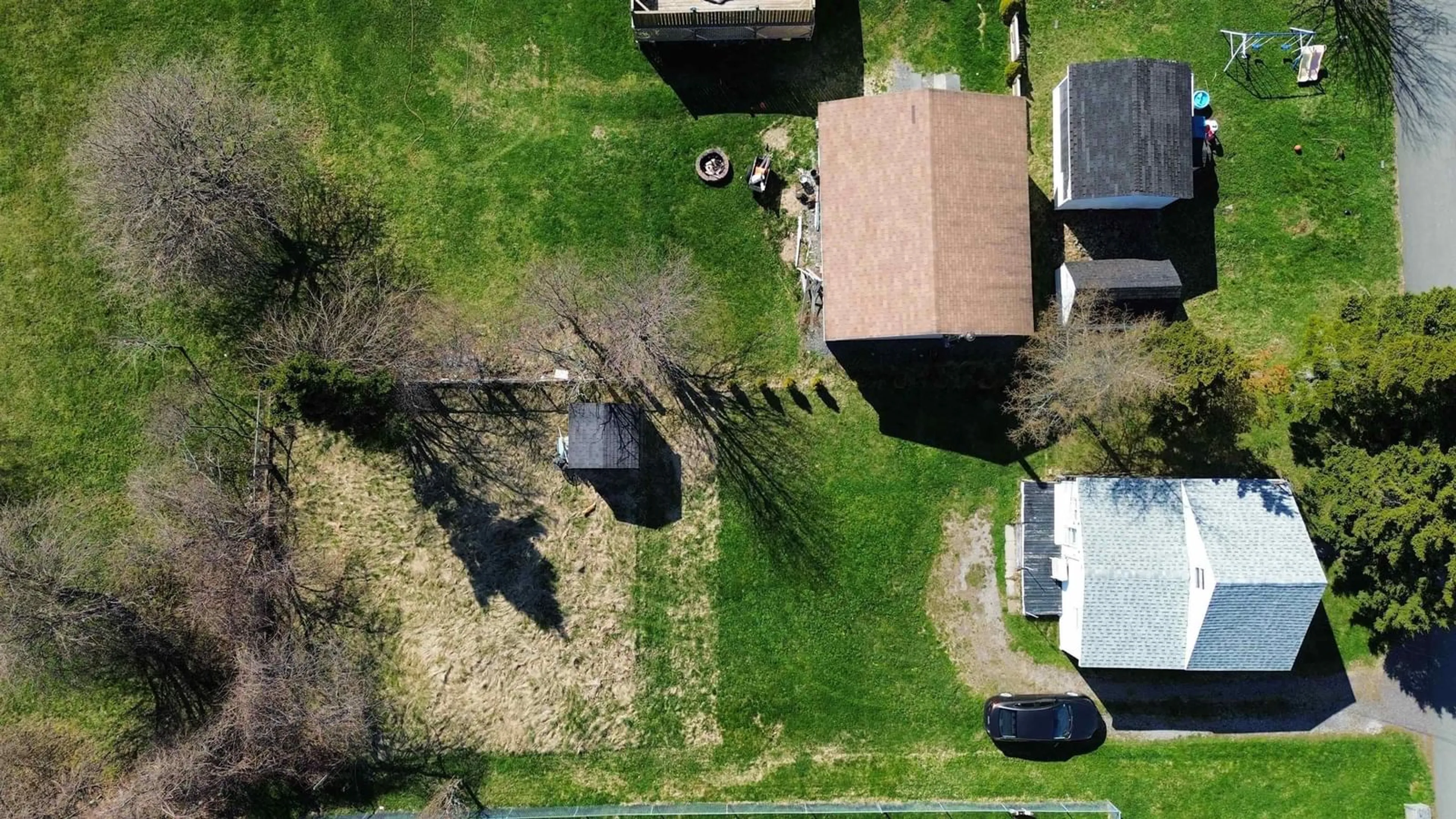 A pic from outside/outdoor area/front of a property/back of a property/a pic from drone, street for 3094 East Ave, New Waterford Nova Scotia B1H 1S1