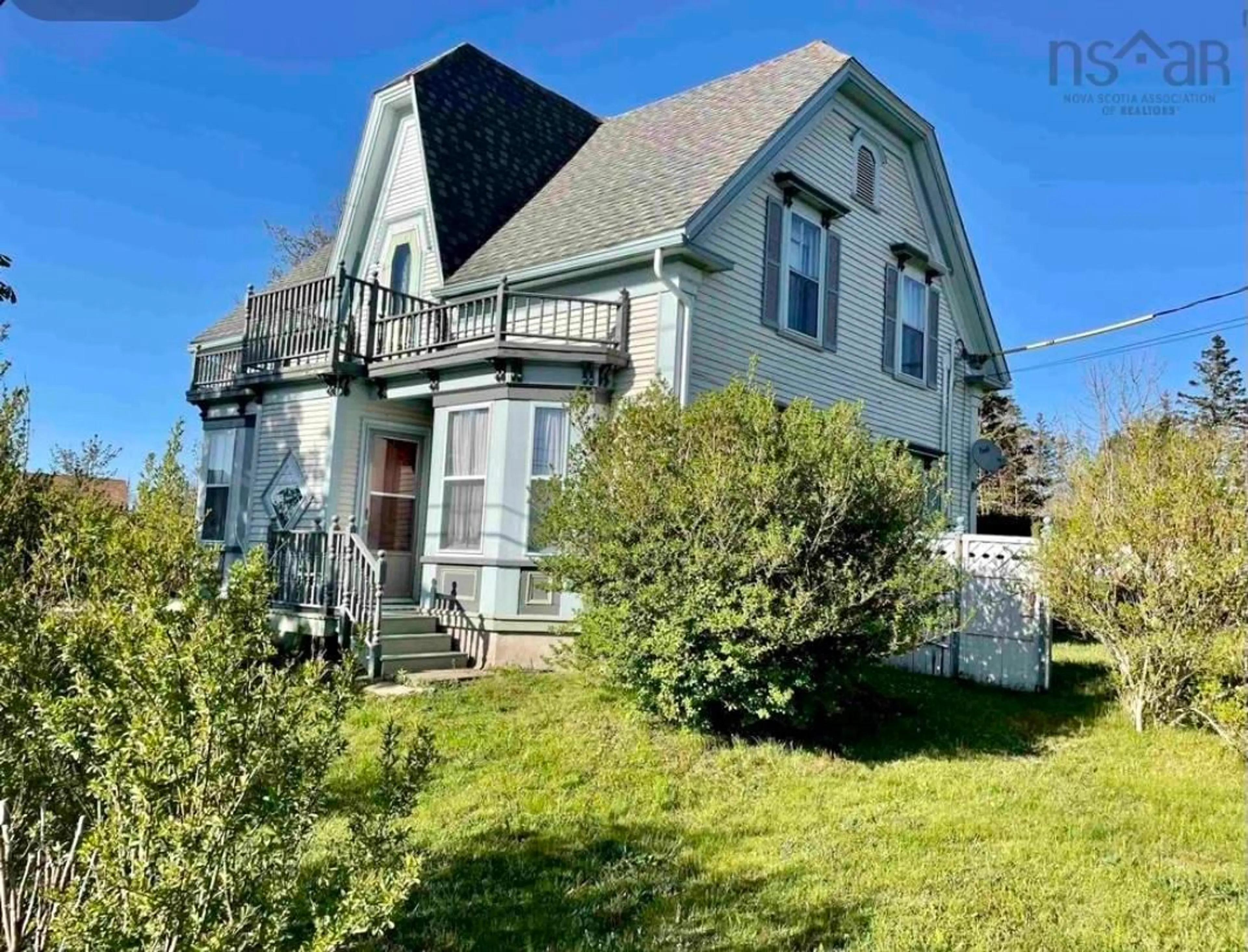 Home with vinyl exterior material, street for 6818 Highway 3, Woods Harbour Nova Scotia B0W 2E0
