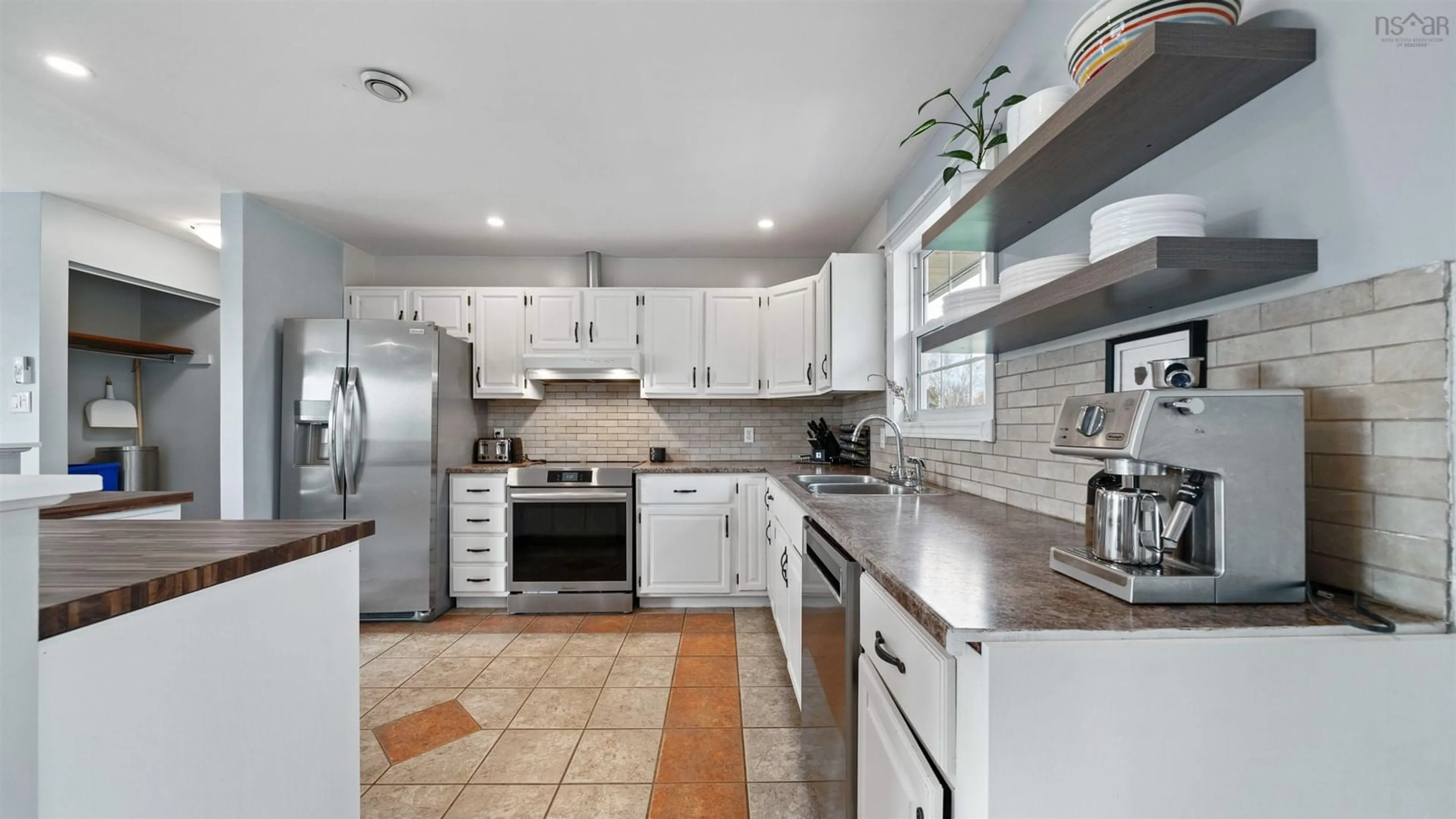 Open concept kitchen, ceramic/tile floor for 209 John Stewart Dr, Dartmouth Nova Scotia B2W 5W6