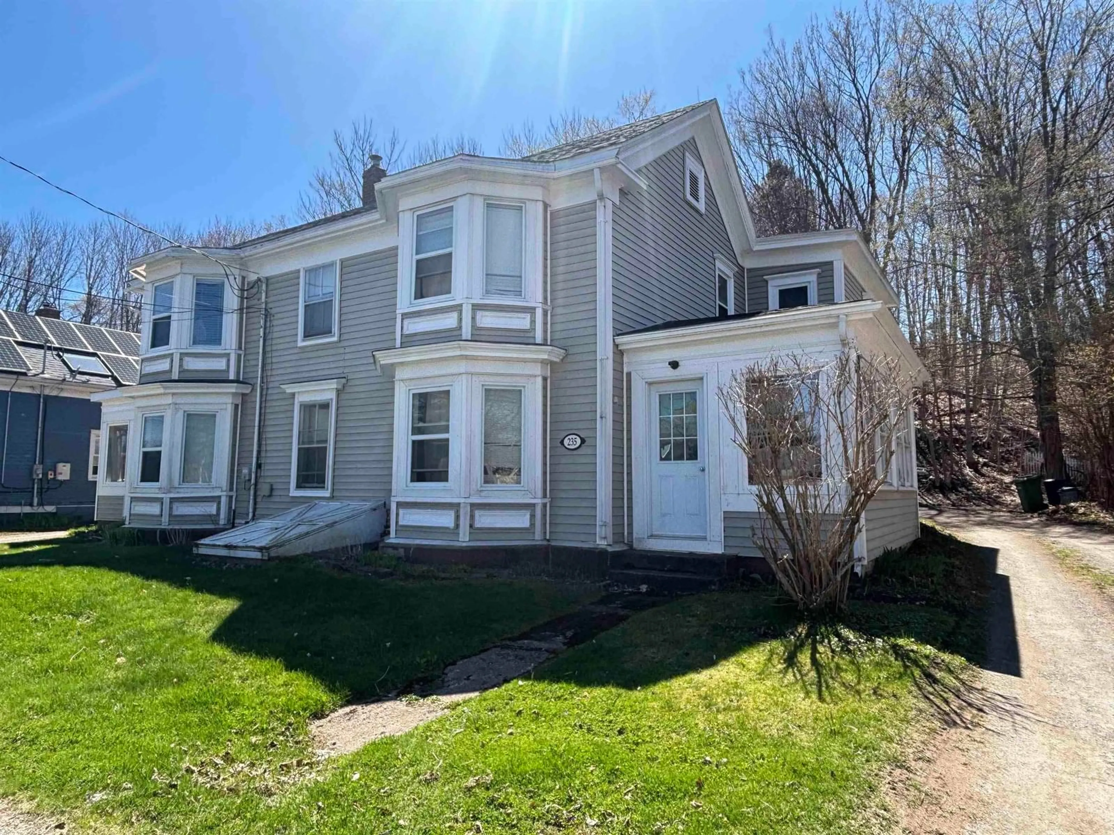 A pic from outside/outdoor area/front of a property/back of a property/a pic from drone, unknown for 235 Main St, Wolfville Nova Scotia B4P 1C5