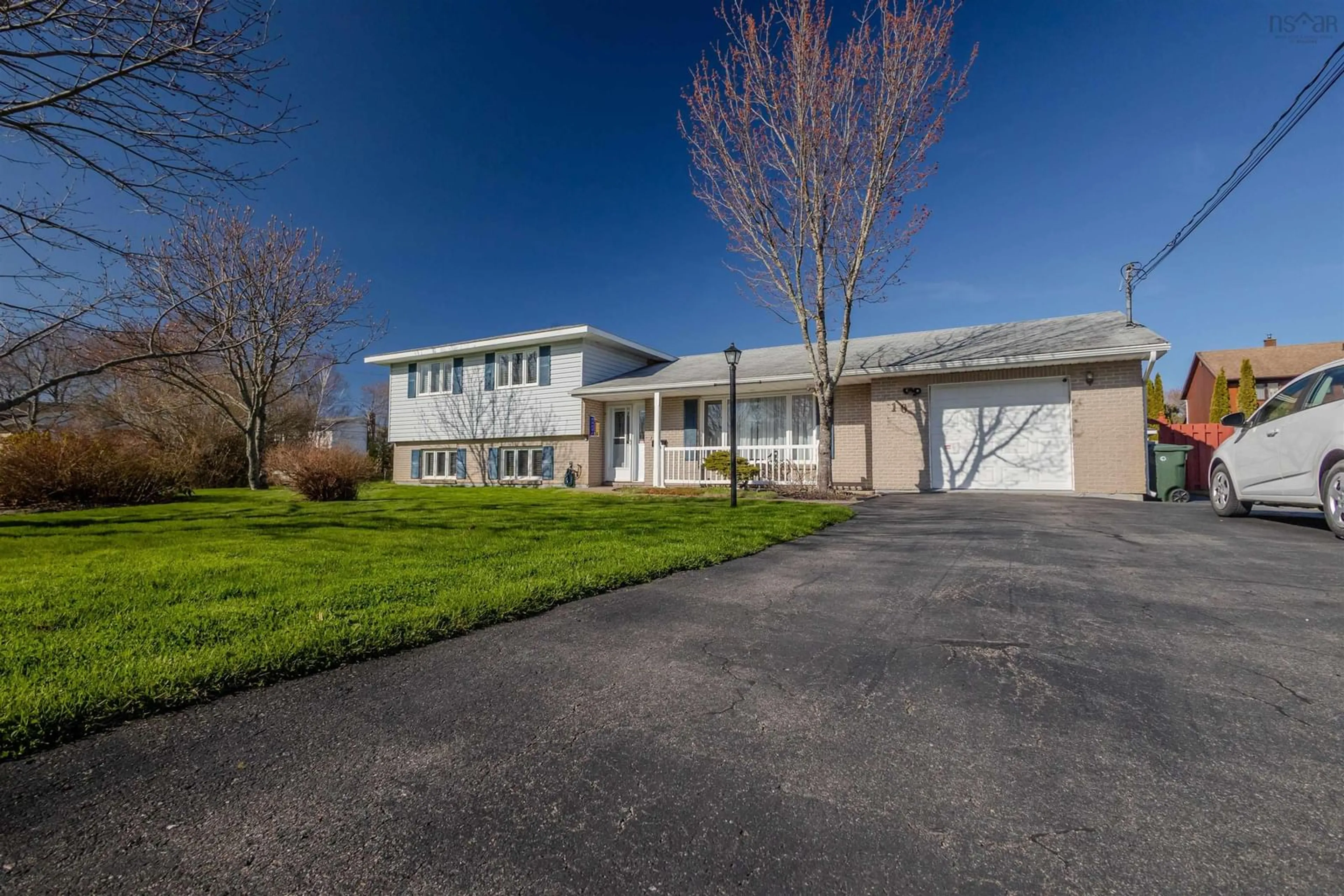 A pic from outside/outdoor area/front of a property/back of a property/a pic from drone, street for 10 Wyndale Crescent, Sydney River Nova Scotia B1S 3R9