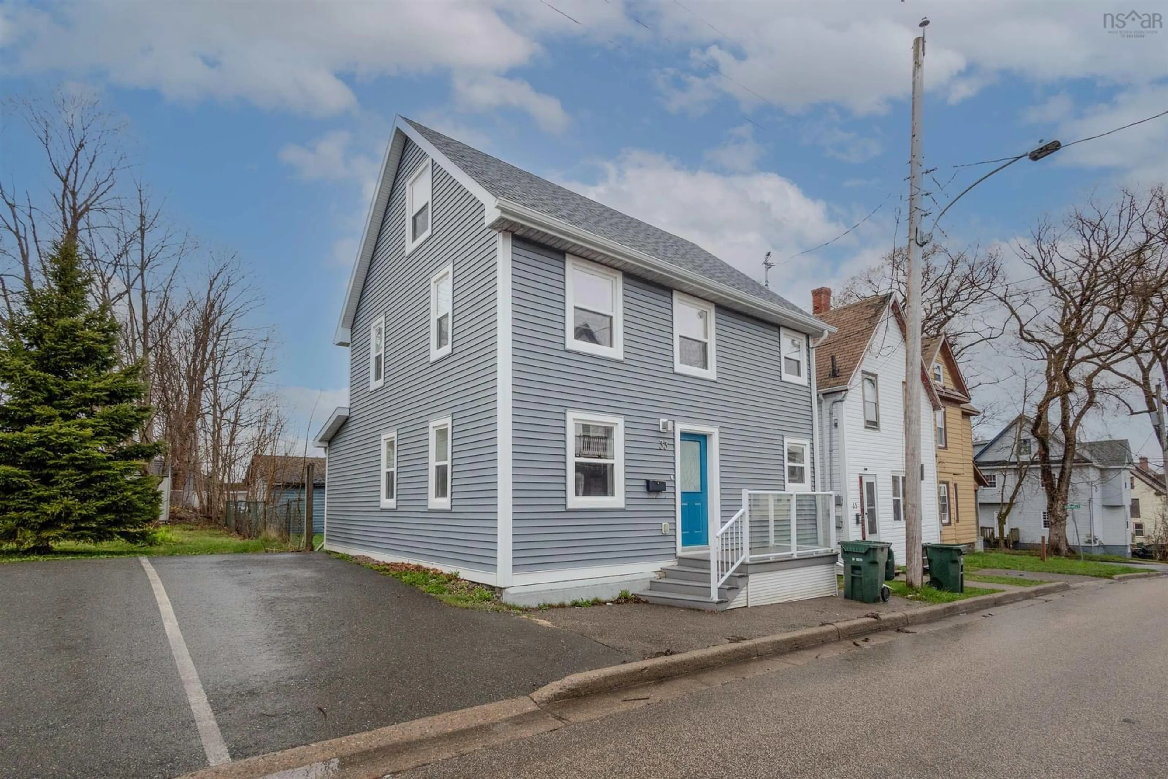 Home with vinyl exterior material, street for 33 Amelia St, Sydney Nova Scotia B1P 6C3