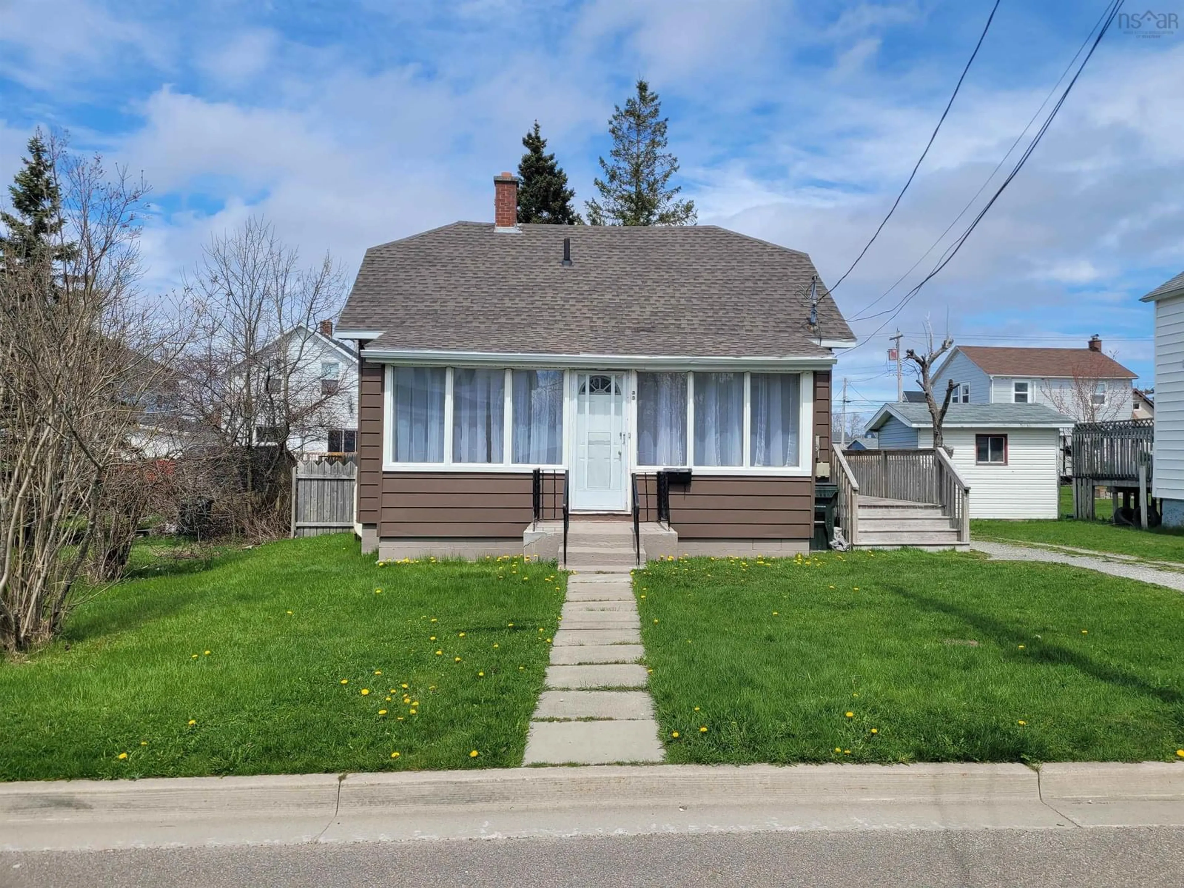 Home with vinyl exterior material, street for 33 Mercer St, Whitney Pier Nova Scotia B1N 2X8