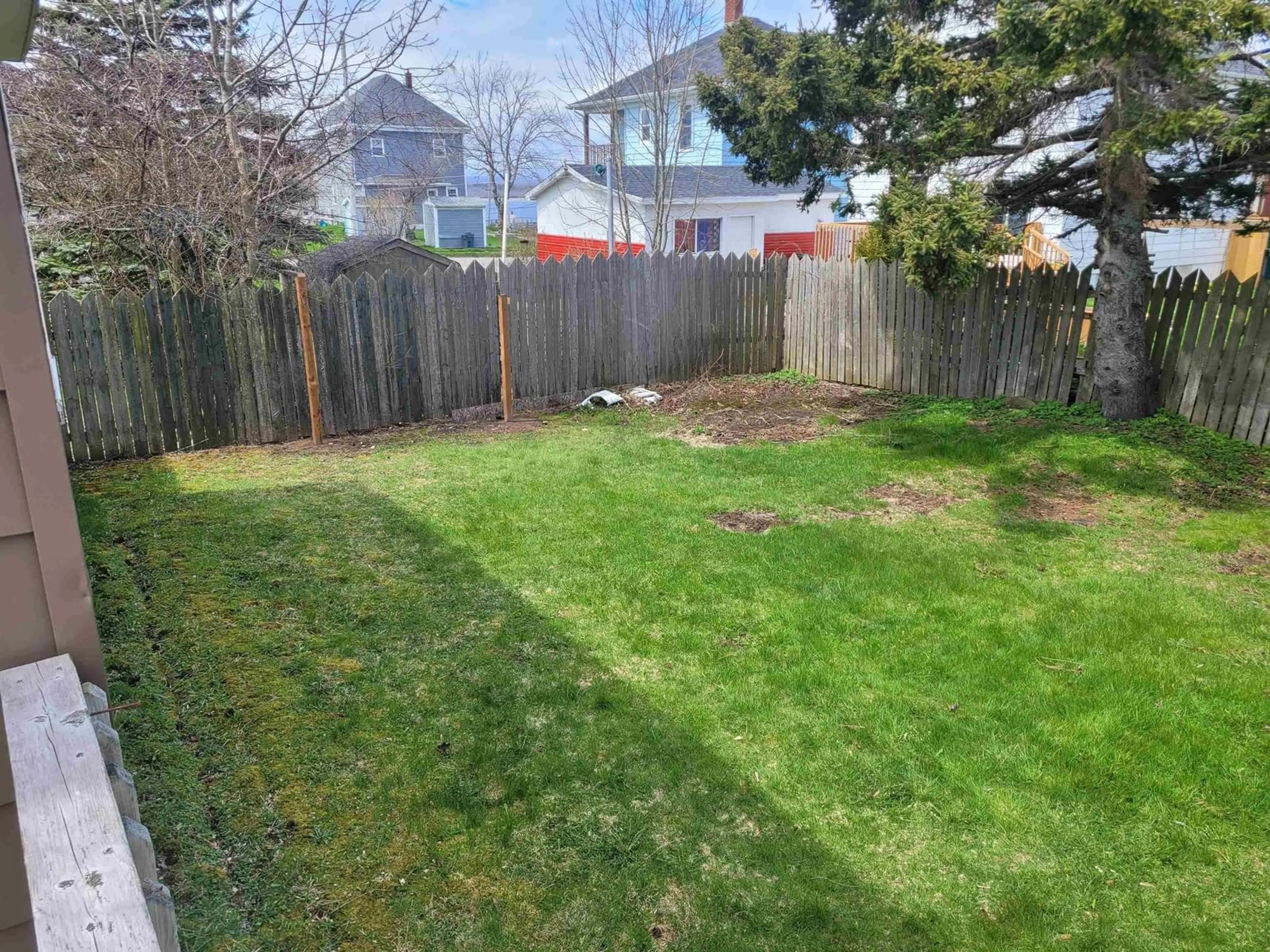A pic from outside/outdoor area/front of a property/back of a property/a pic from drone, unknown for 33 Mercer St, Whitney Pier Nova Scotia B1N 2X8