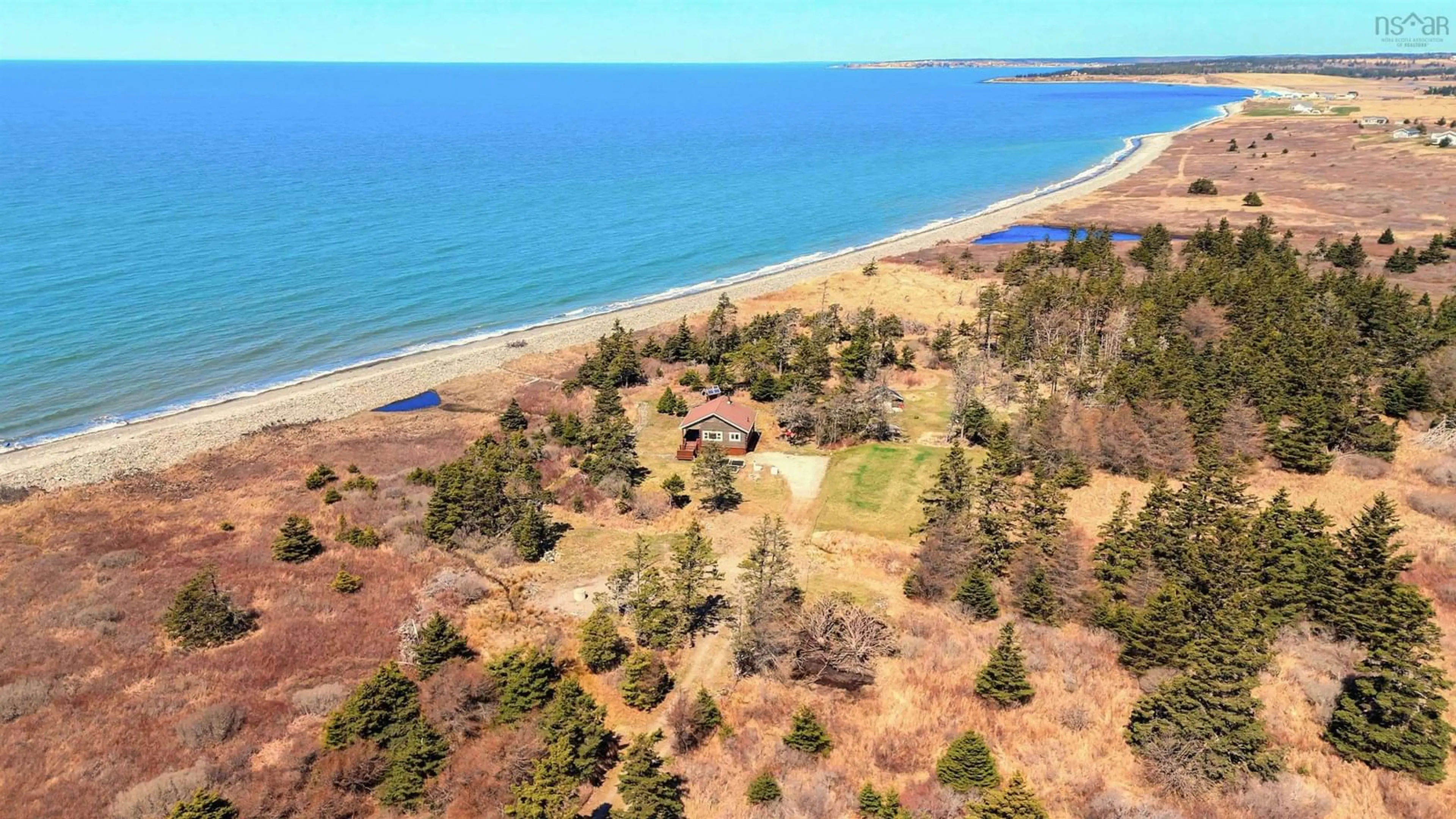 A pic from outside/outdoor area/front of a property/back of a property/a pic from drone, water/lake/river/ocean view for 25 Dargie Cove Rd, Woodvale Nova Scotia B5A 5B1