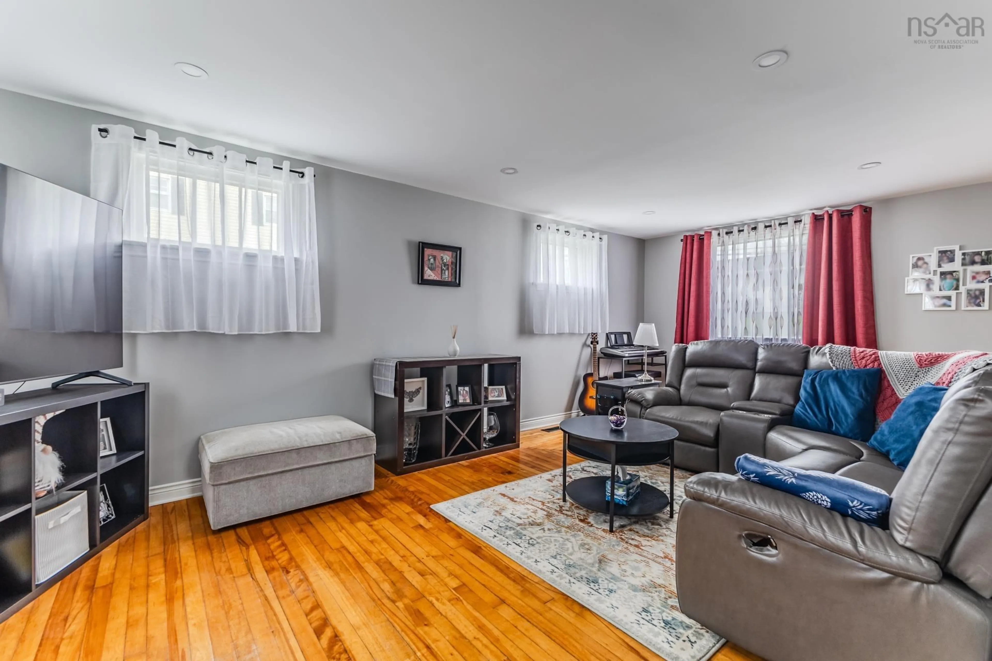 Living room with furniture, wood/laminate floor for 81 Macdonald St, Truro Nova Scotia B2N 1T5