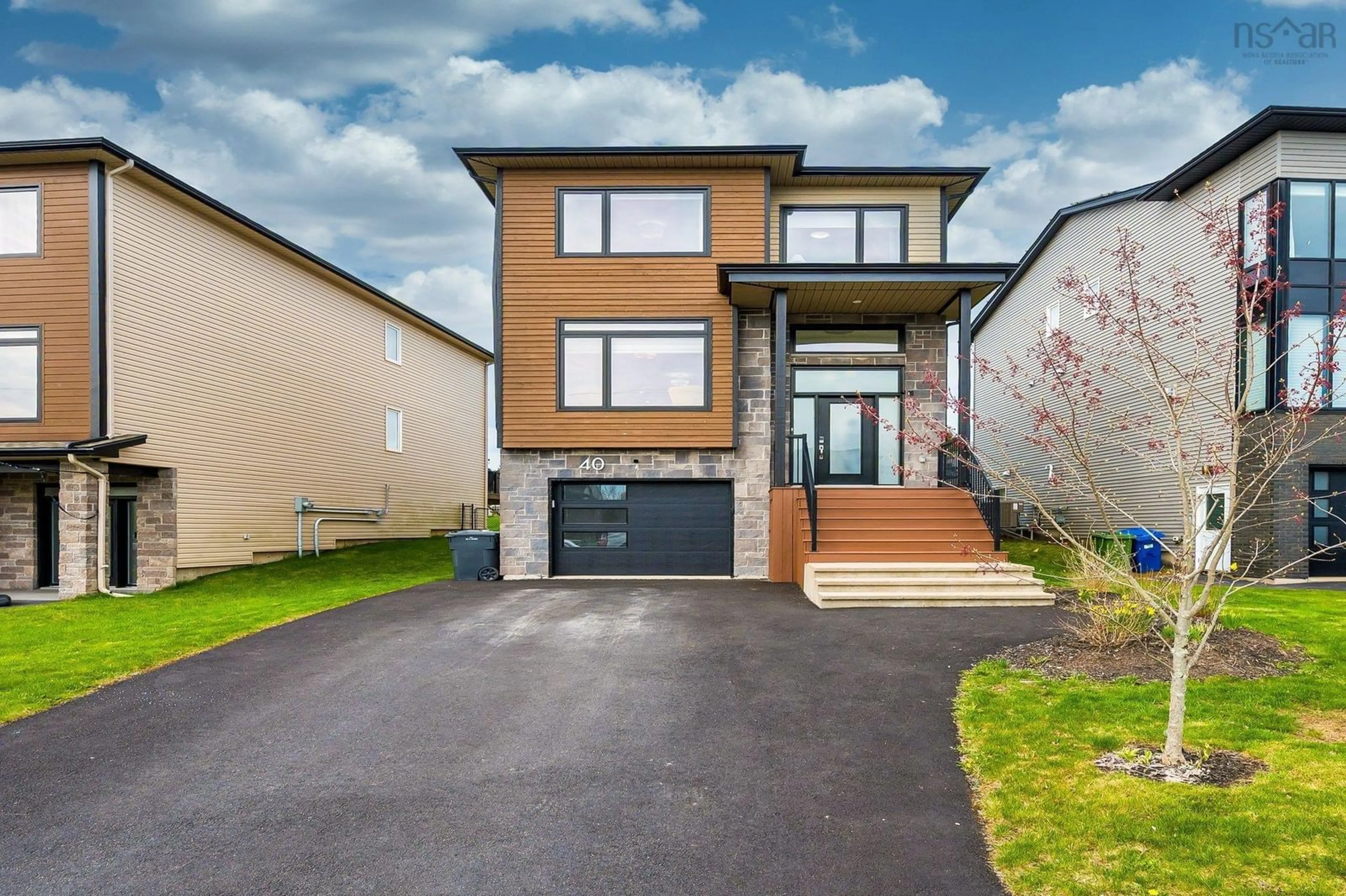 Home with brick exterior material, street for 40 Bramwell Crt, West Bedford Nova Scotia B4B 0W2