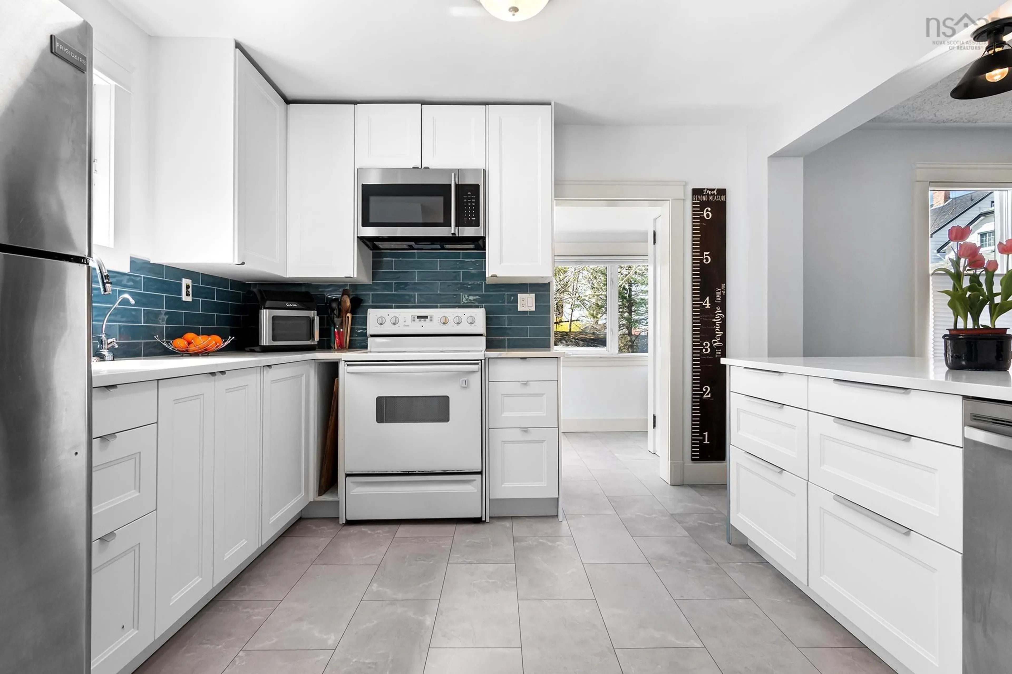 Open concept kitchen, ceramic/tile floor for 3534 Agricola St, Halifax Nova Scotia B3K 4J5