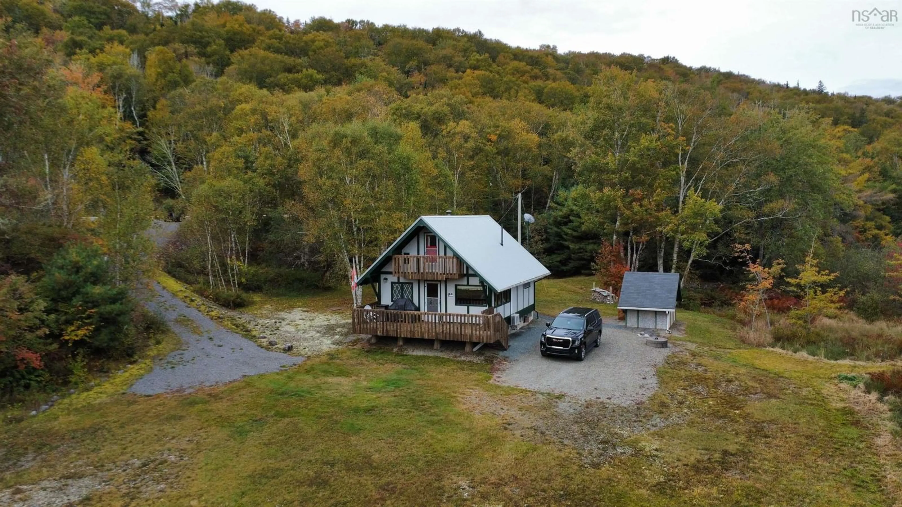 A pic from outside/outdoor area/front of a property/back of a property/a pic from drone, unknown for 1007 Highway 211, Jordanville Nova Scotia B0J 3C0