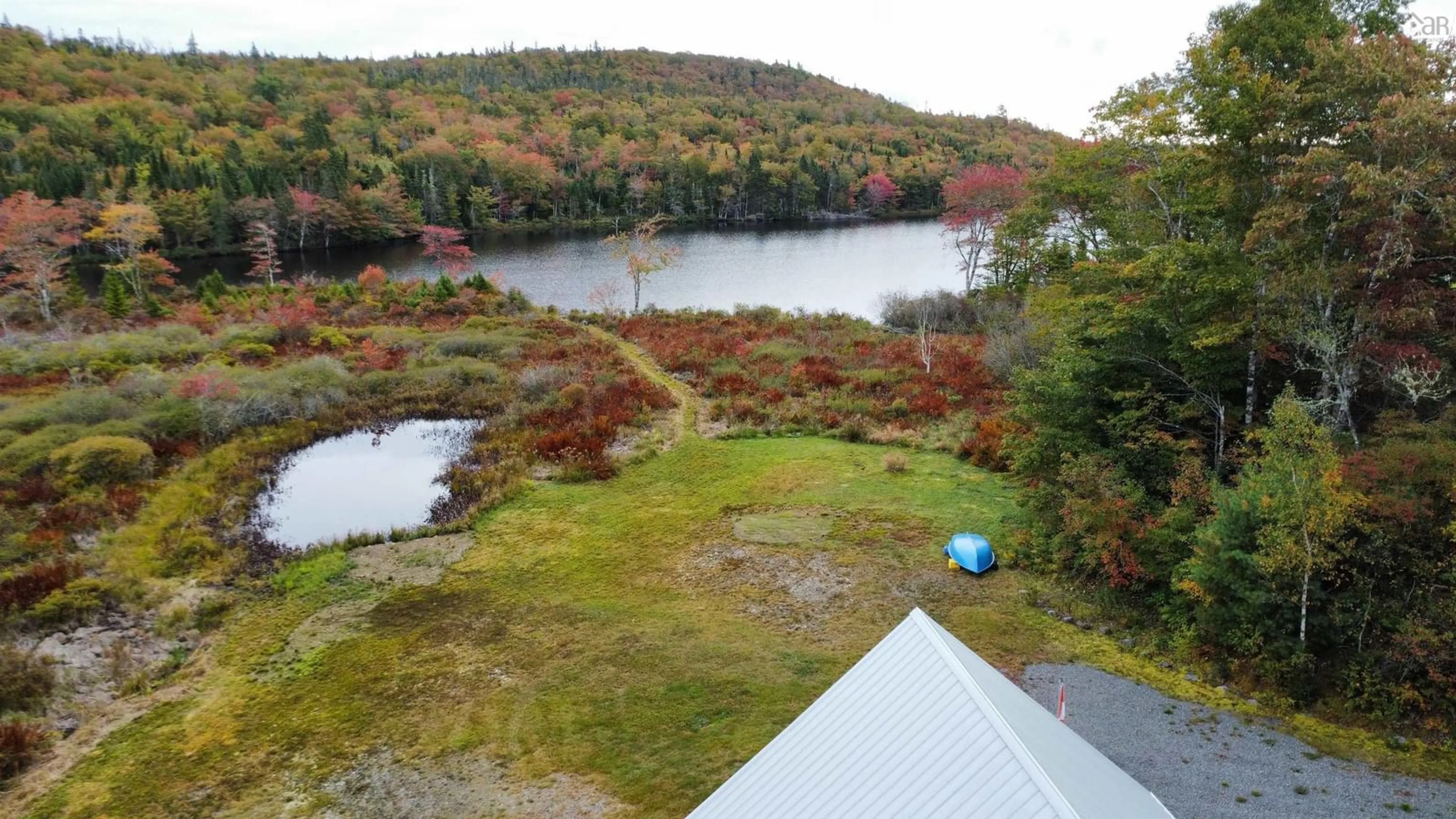 A pic from outside/outdoor area/front of a property/back of a property/a pic from drone, water/lake/river/ocean view for 1007 Highway 211, Jordanville Nova Scotia B0J 3C0