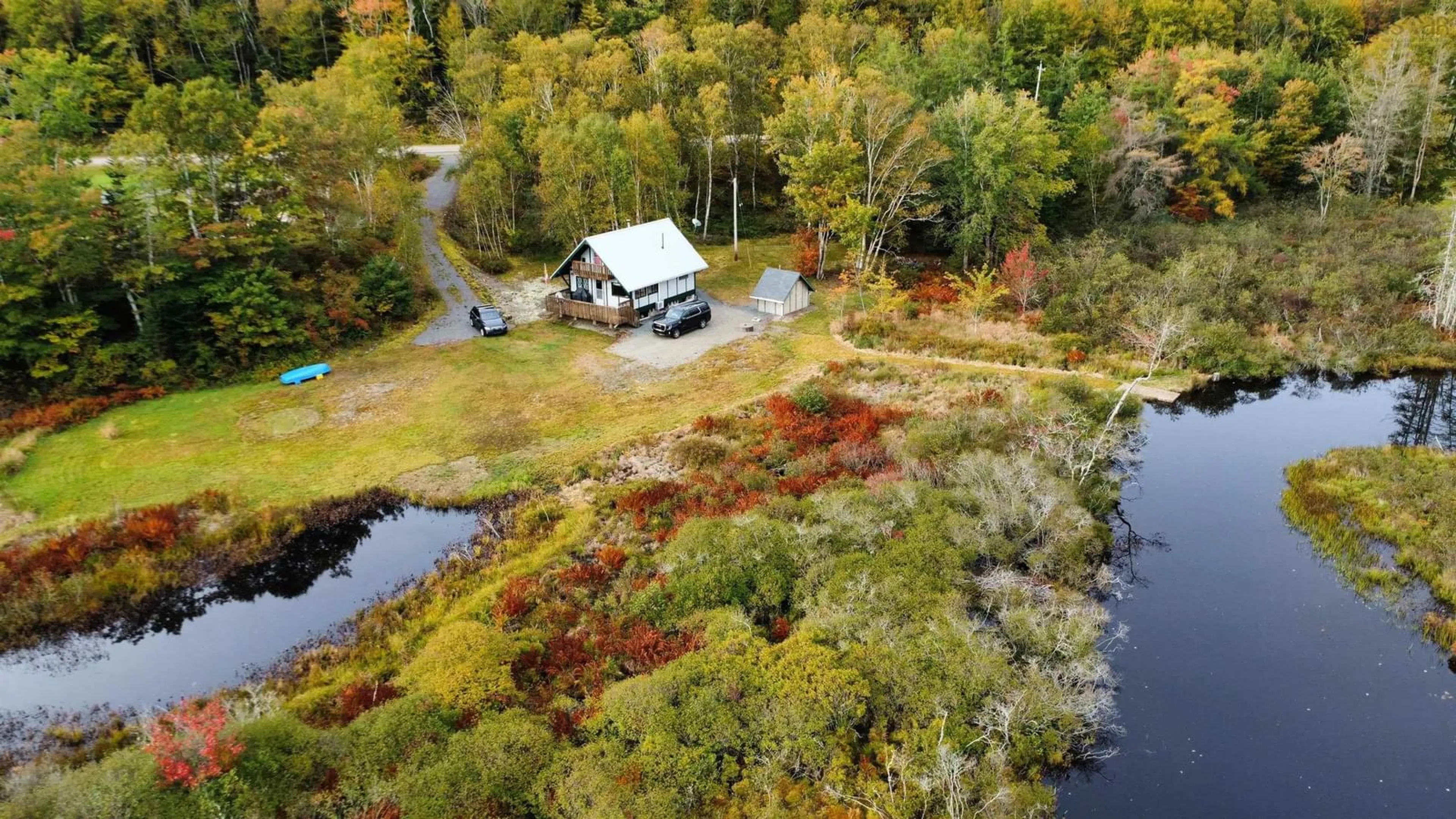 A pic from outside/outdoor area/front of a property/back of a property/a pic from drone, water/lake/river/ocean view for 1007 Highway 211, Jordanville Nova Scotia B0J 3C0