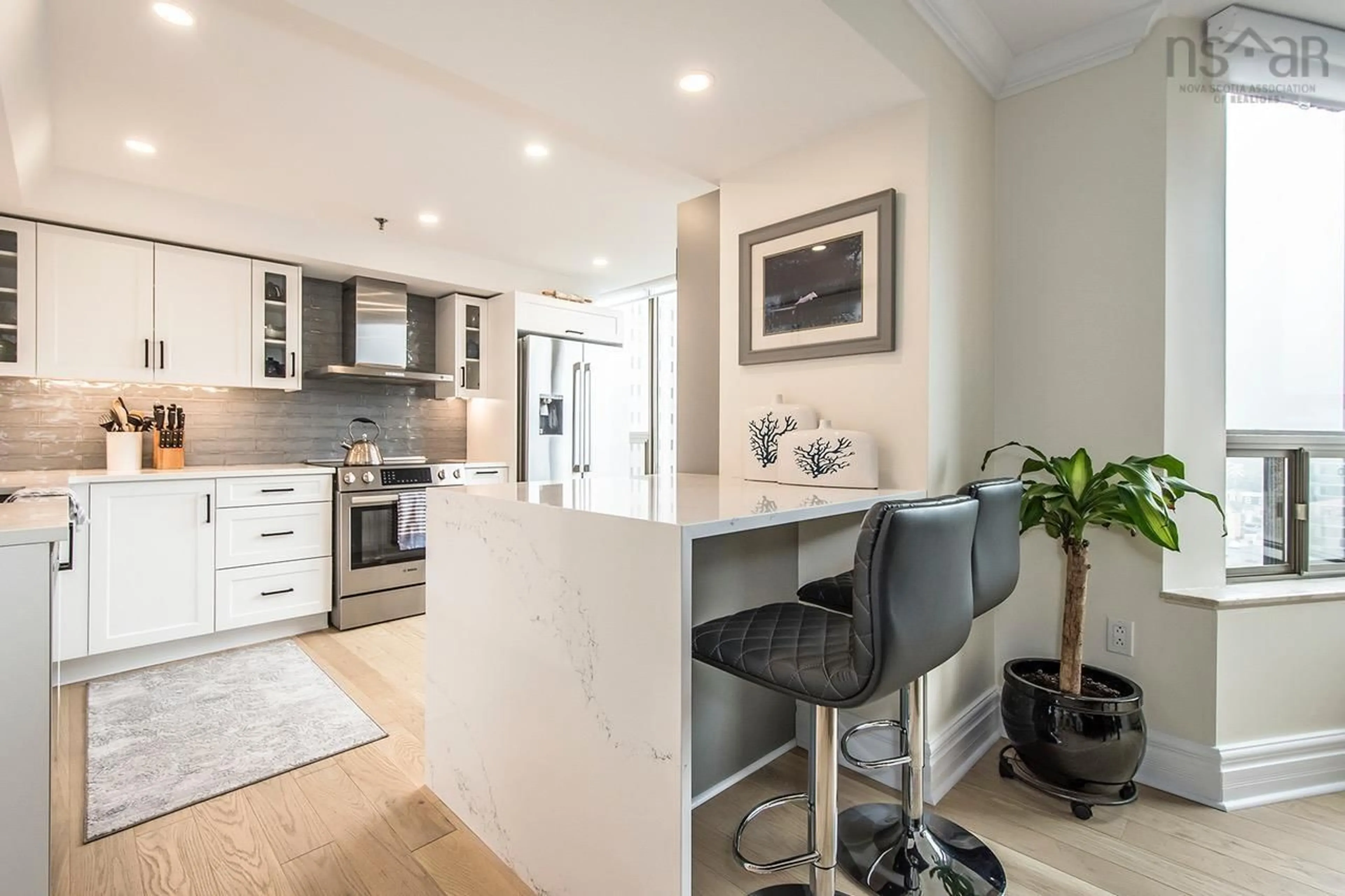 Open concept kitchen, wood/laminate floor for 1470 Summer St #1105, Halifax Nova Scotia B3H 3A3