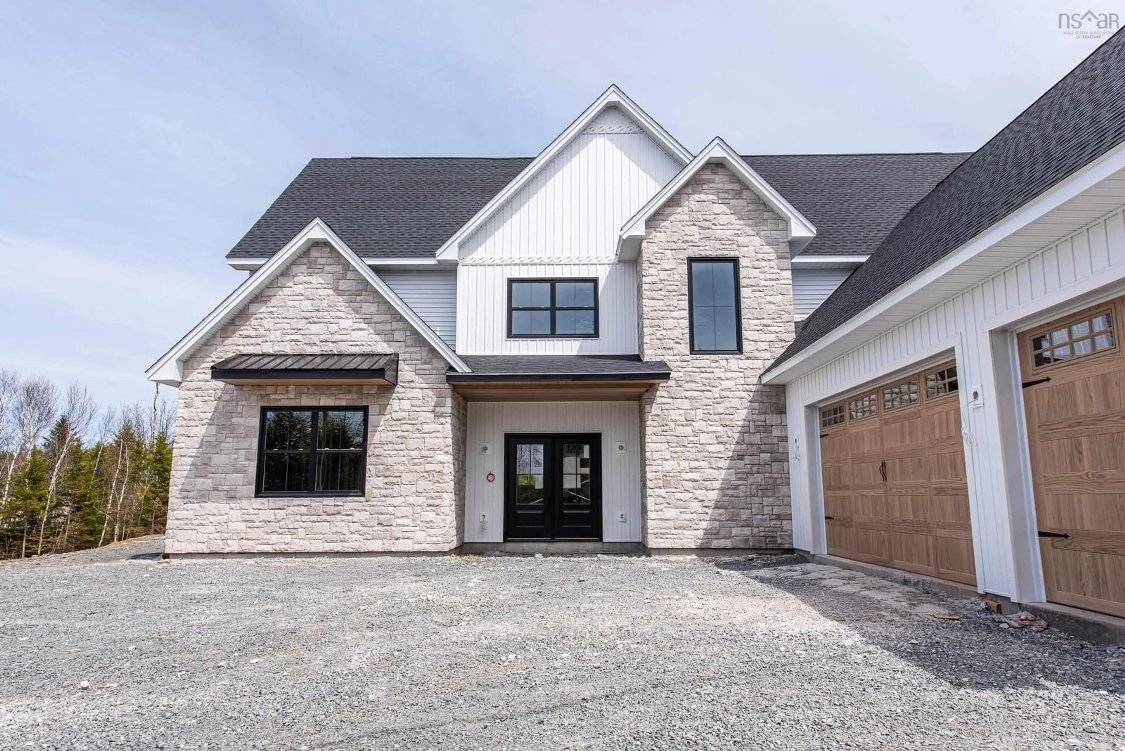 Home with brick exterior material, street for 372 Canoe Cres, Hammonds Plains Nova Scotia B4B 2P5