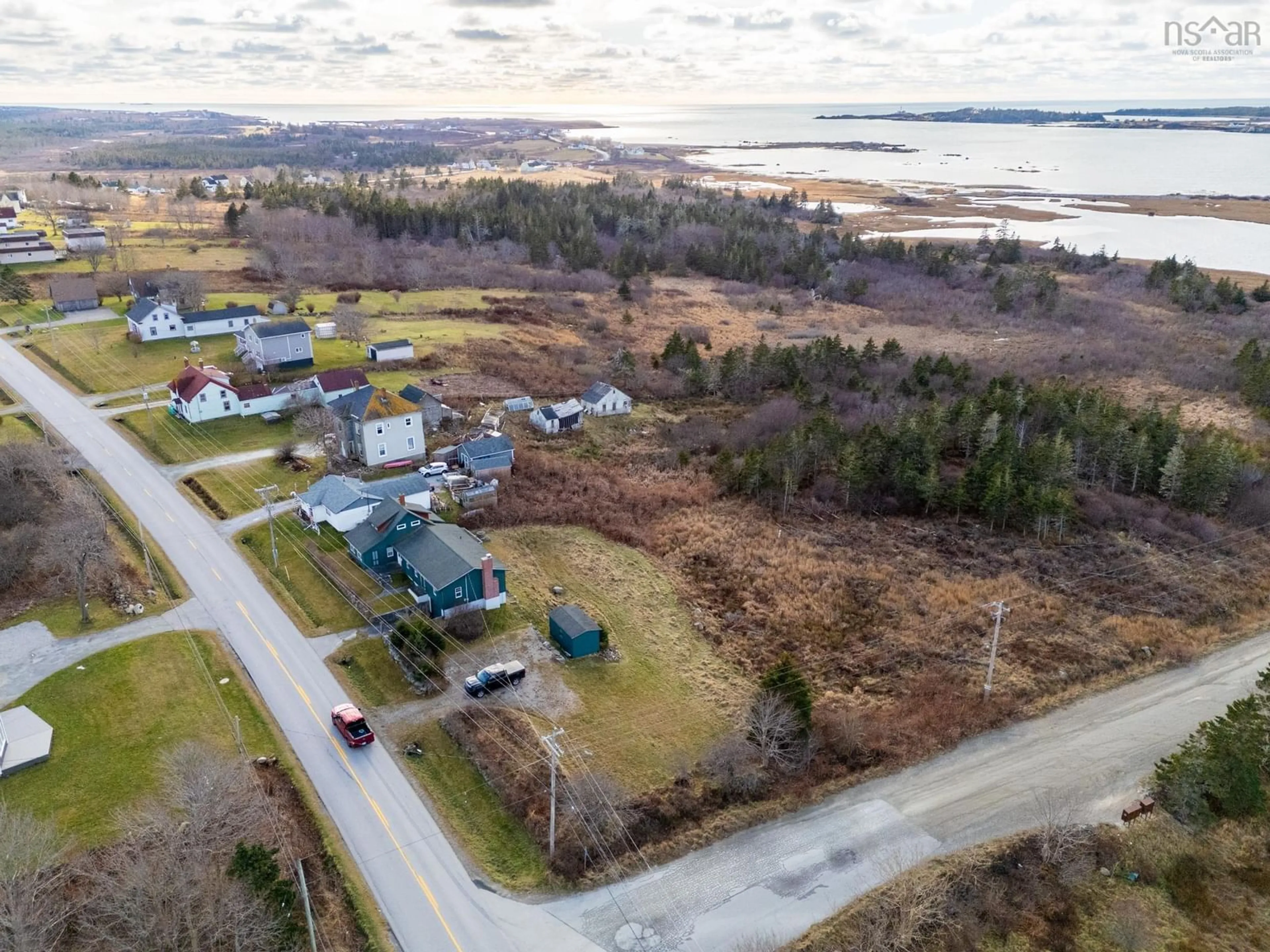 A pic from outside/outdoor area/front of a property/back of a property/a pic from drone, water/lake/river/ocean view for 2473 Chebogue Rd, Sand Beach Nova Scotia B5A 4H2