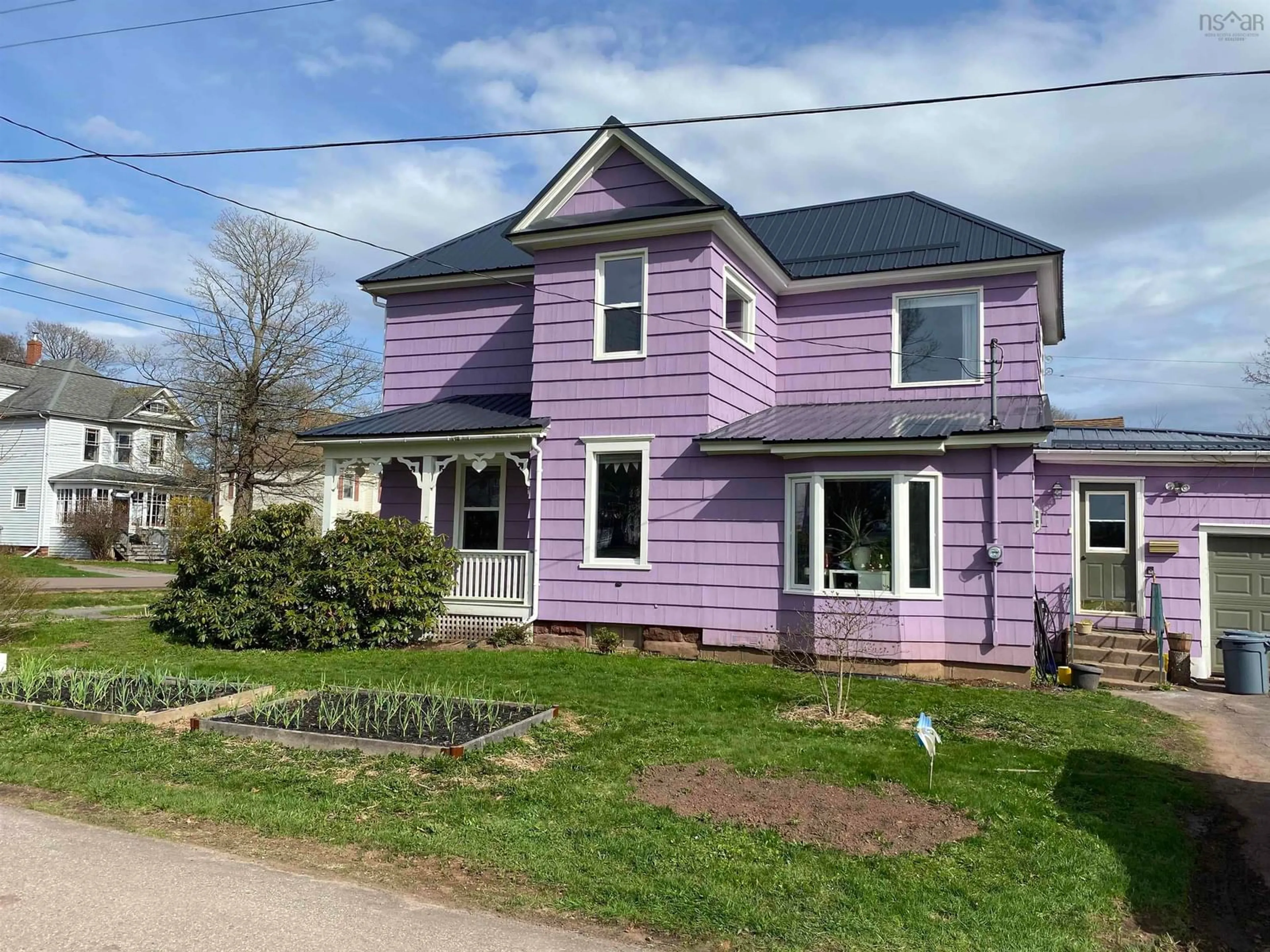 Home with vinyl exterior material, street for 21 Clarence St, Amherst Nova Scotia B4N 3P2