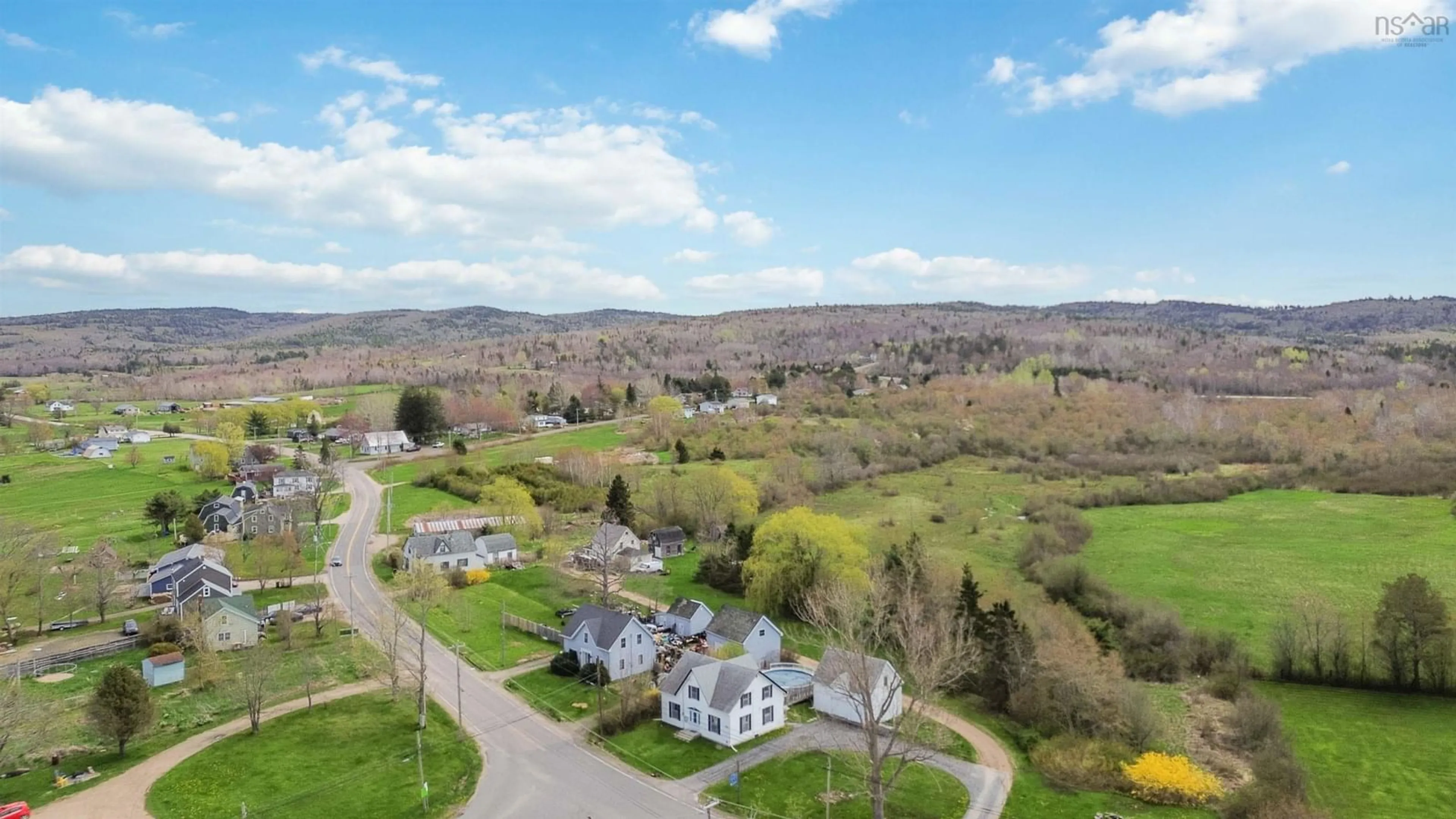 A pic from outside/outdoor area/front of a property/back of a property/a pic from drone, mountain view for 4164 Highway 201, Bridgetown Nova Scotia B0S 1C0