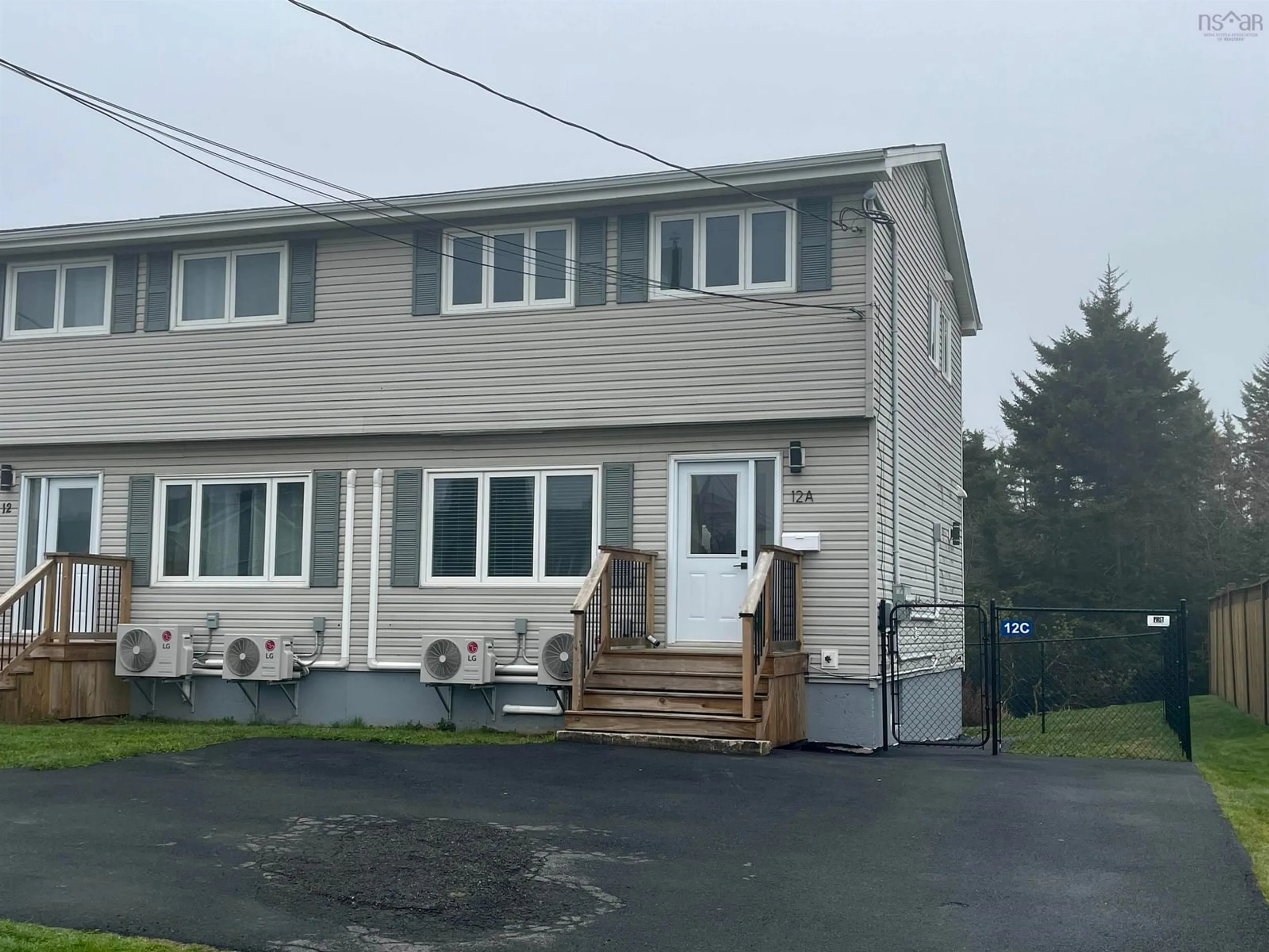 Home with vinyl exterior material, street for 12A Linden Lane, Halifax Nova Scotia B3R 1M9