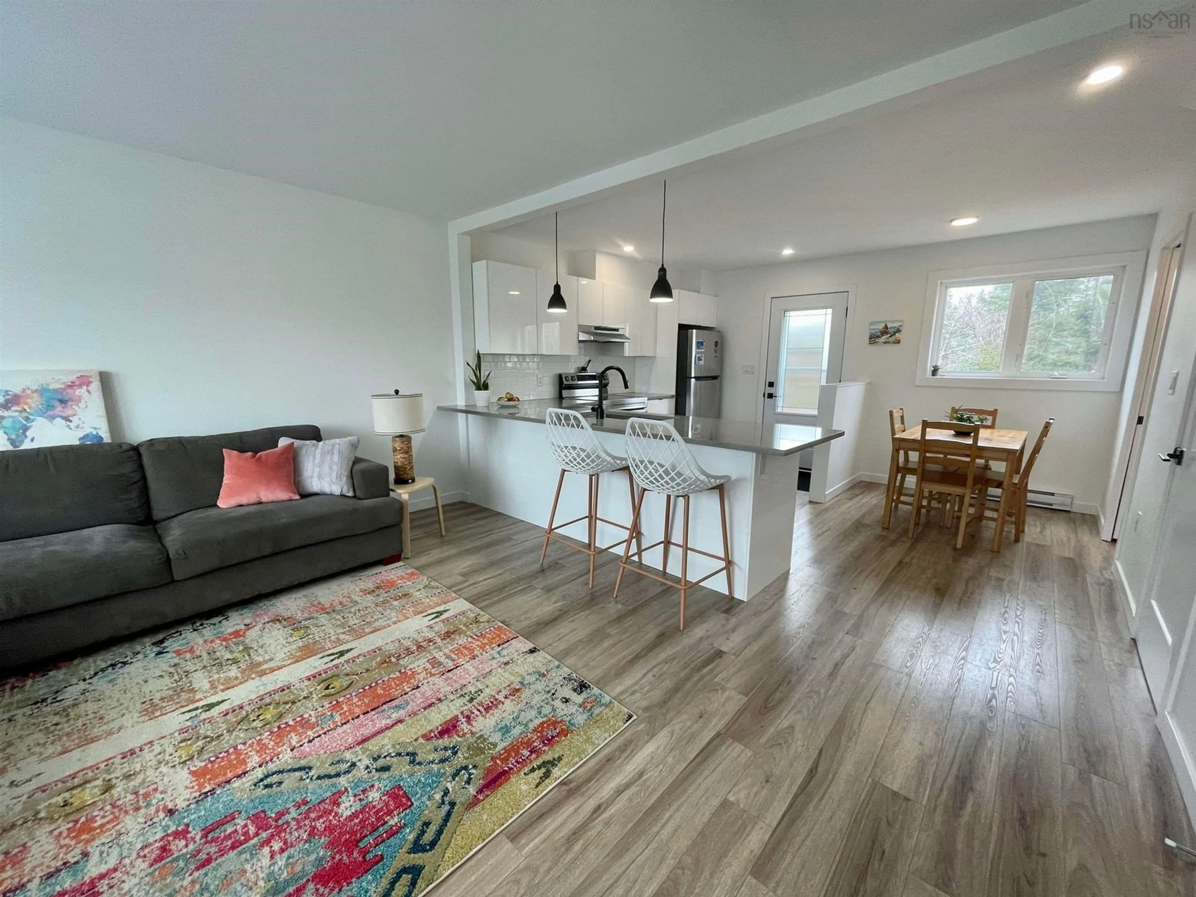 Open concept kitchen, wood/laminate floor for 12A Linden Lane, Halifax Nova Scotia B3R 1M9
