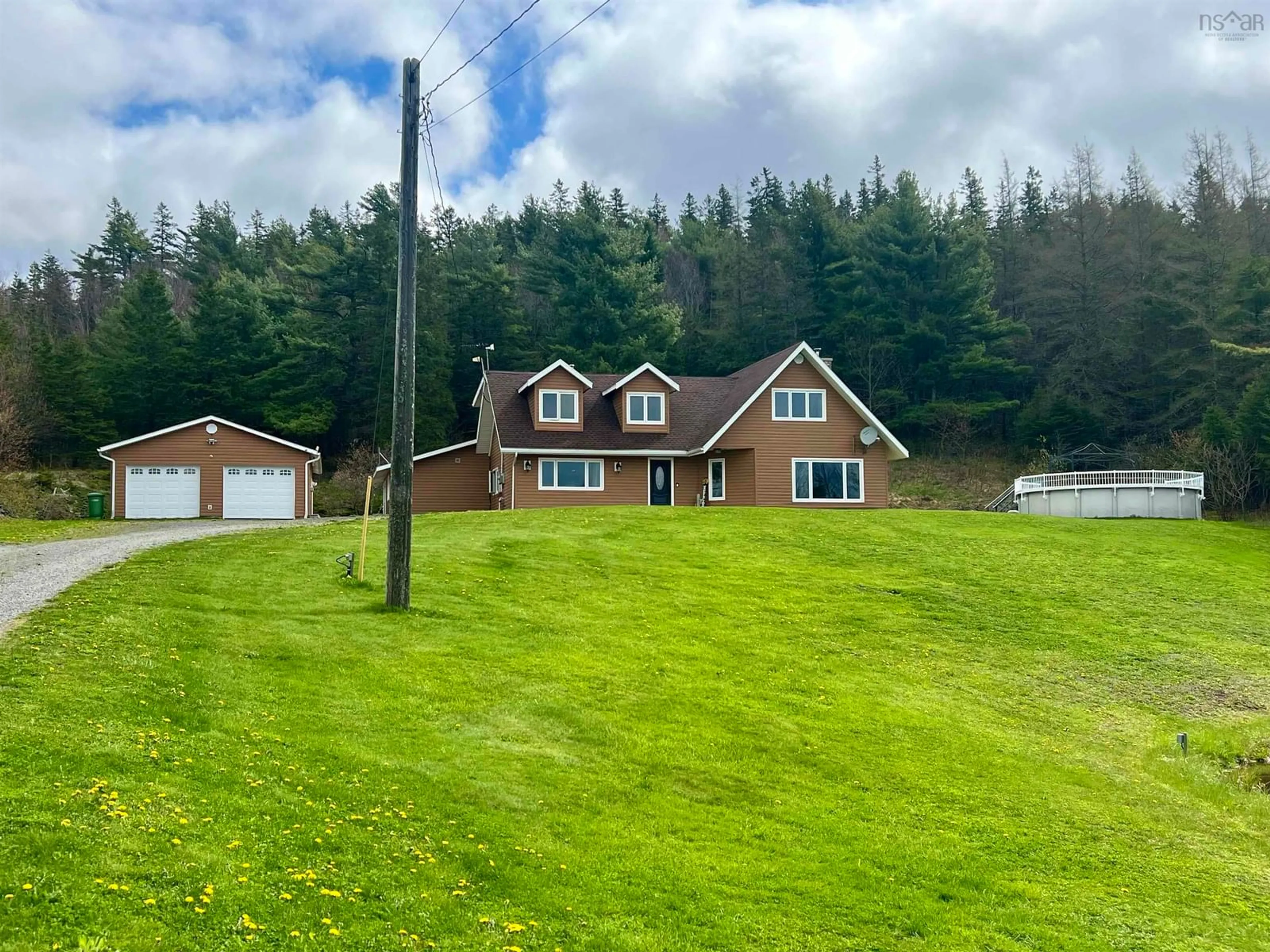 A pic from outside/outdoor area/front of a property/back of a property/a pic from drone, unknown for 700 River Rd, Springville Nova Scotia B0K 1B0
