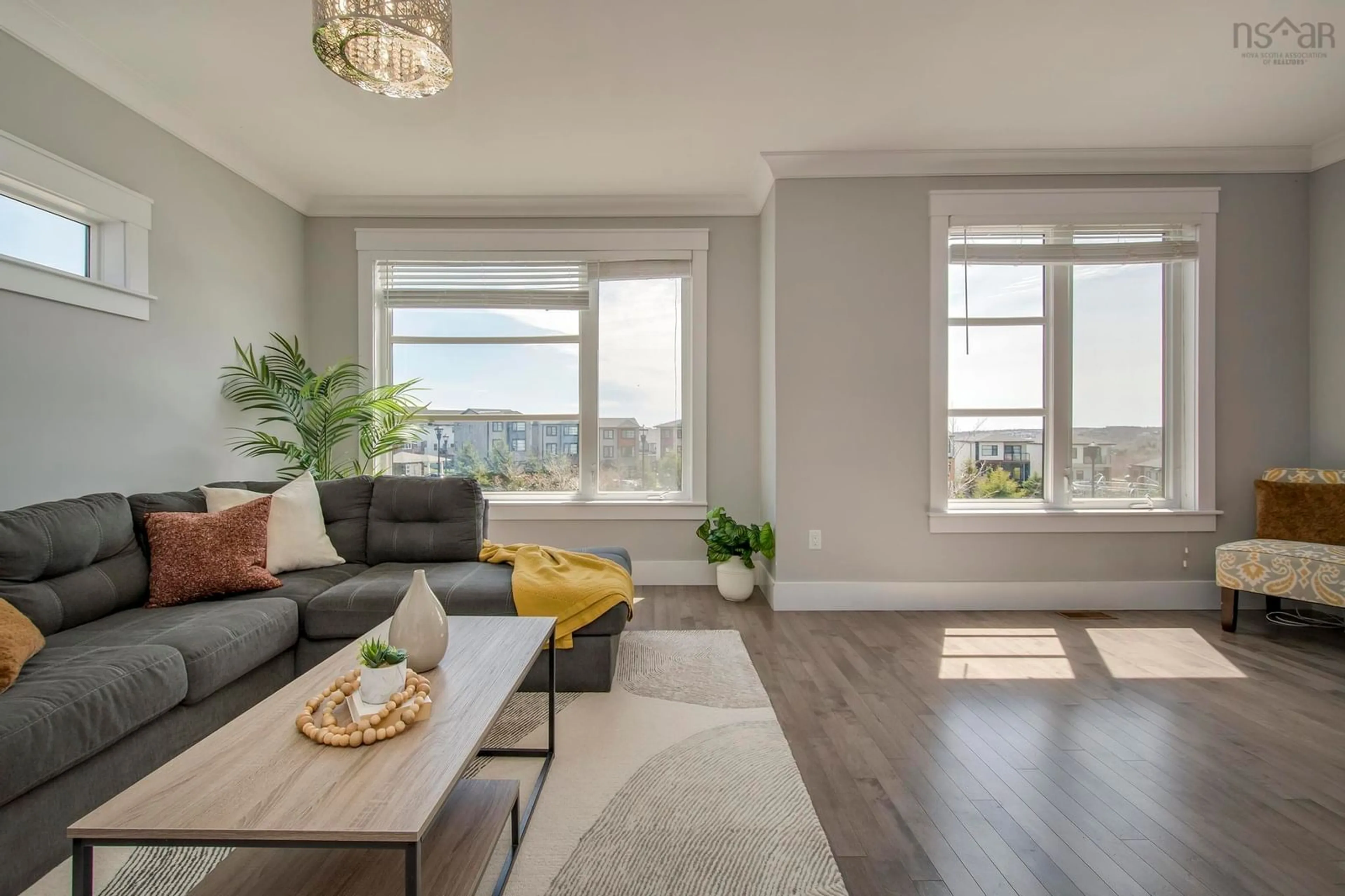 Living room with furniture, wood/laminate floor for 62 Hadley Cres, Halifax Nova Scotia B3P 1P1