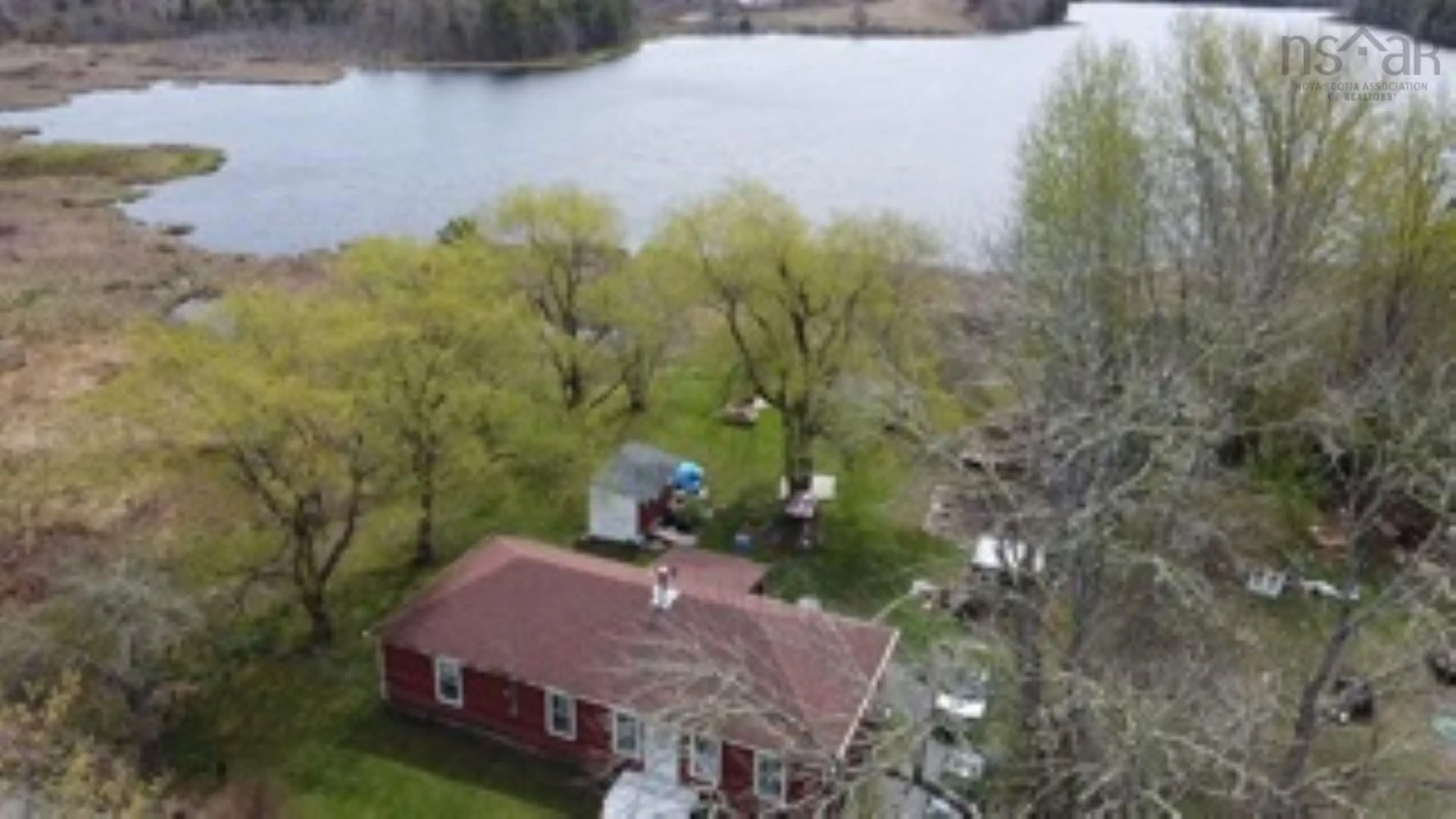 A pic from outside/outdoor area/front of a property/back of a property/a pic from drone, water/lake/river/ocean view for 9773 Highway 8, Caledonia Nova Scotia B0T 1B0