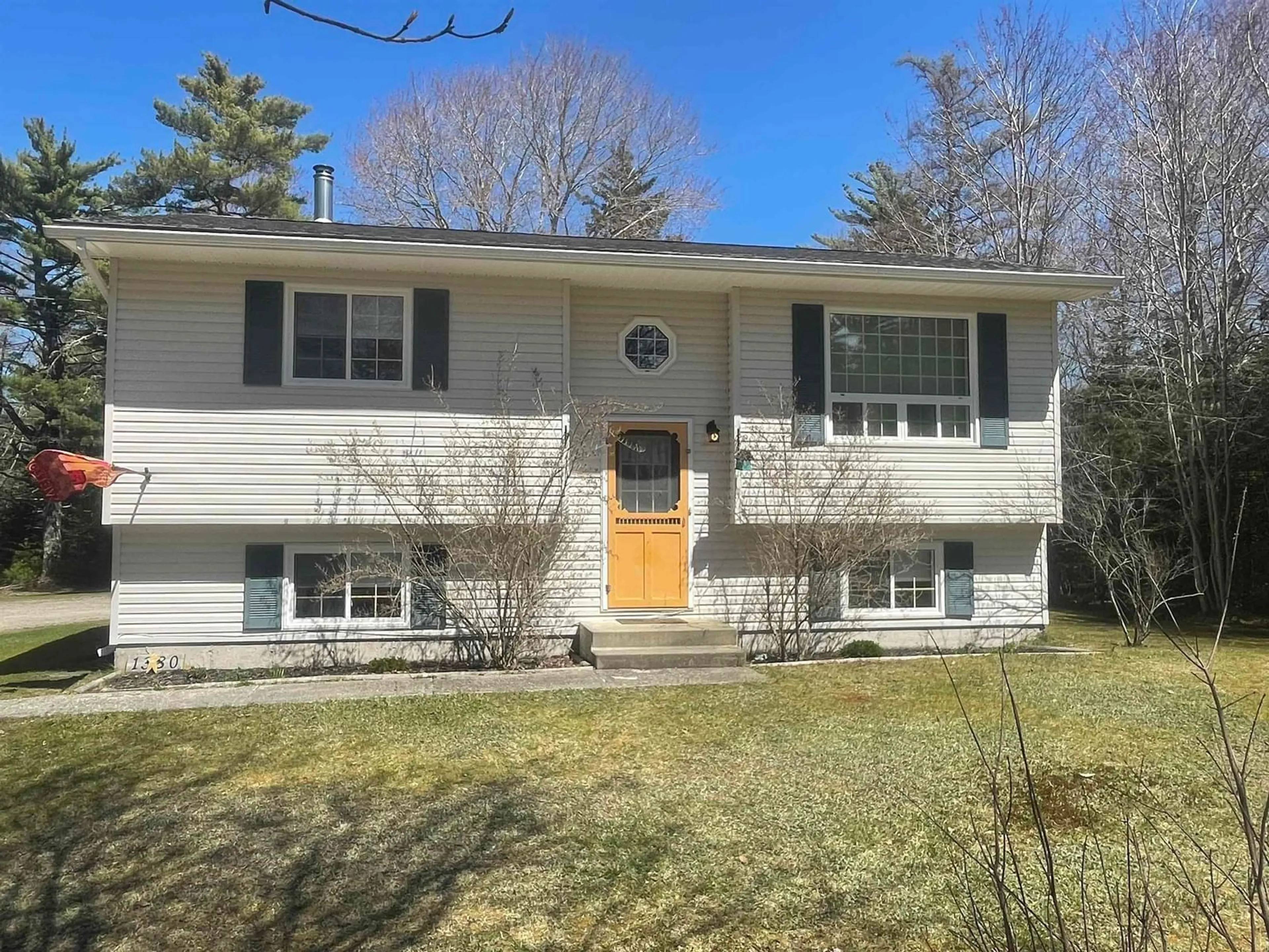 Home with vinyl exterior material, street for 1380 Lake Rd, Sandy Point Nova Scotia B0T 1W0