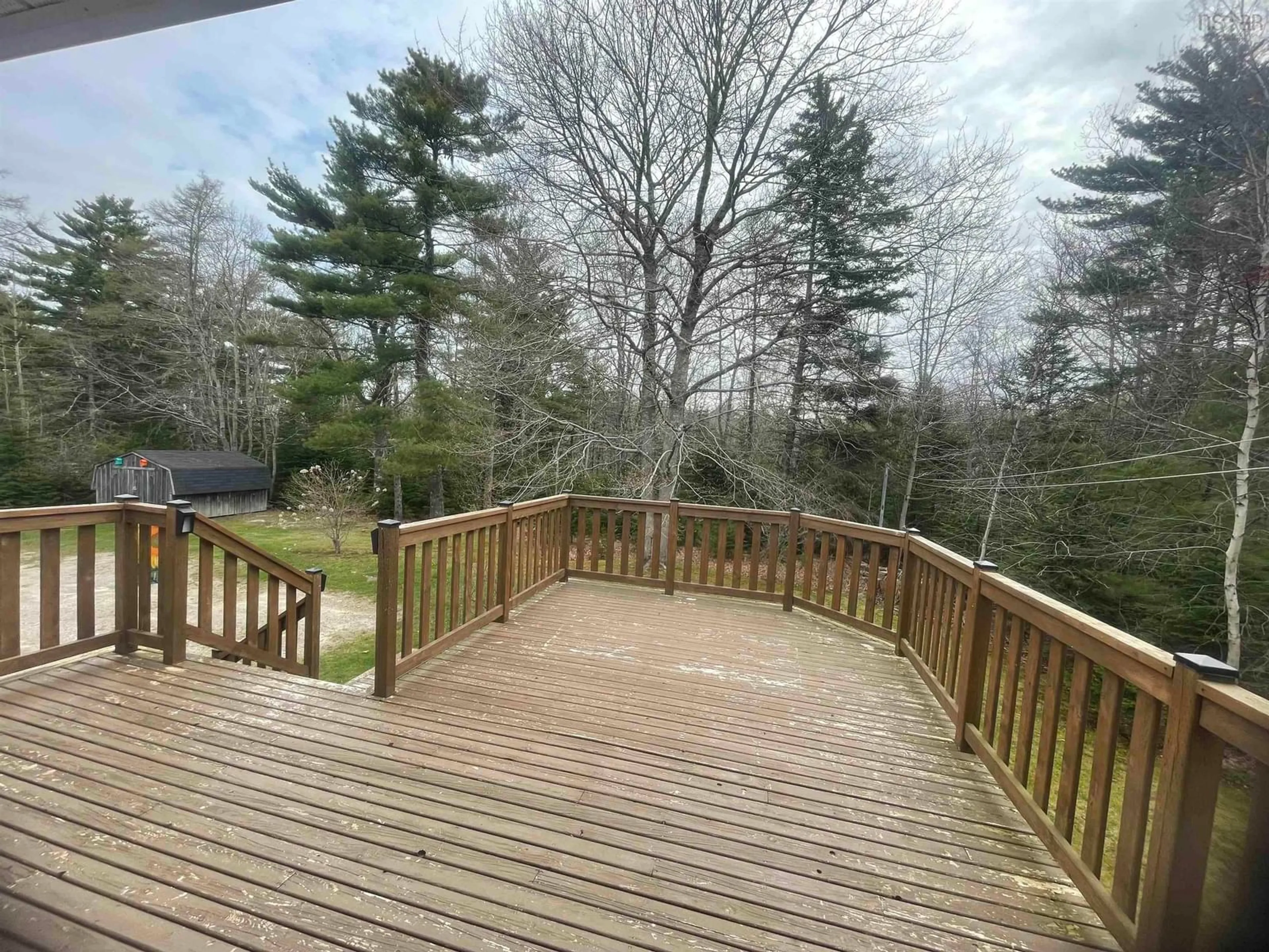 A pic from outside/outdoor area/front of a property/back of a property/a pic from drone, forest/trees view for 1380 Lake Rd, Sandy Point Nova Scotia B0T 1W0