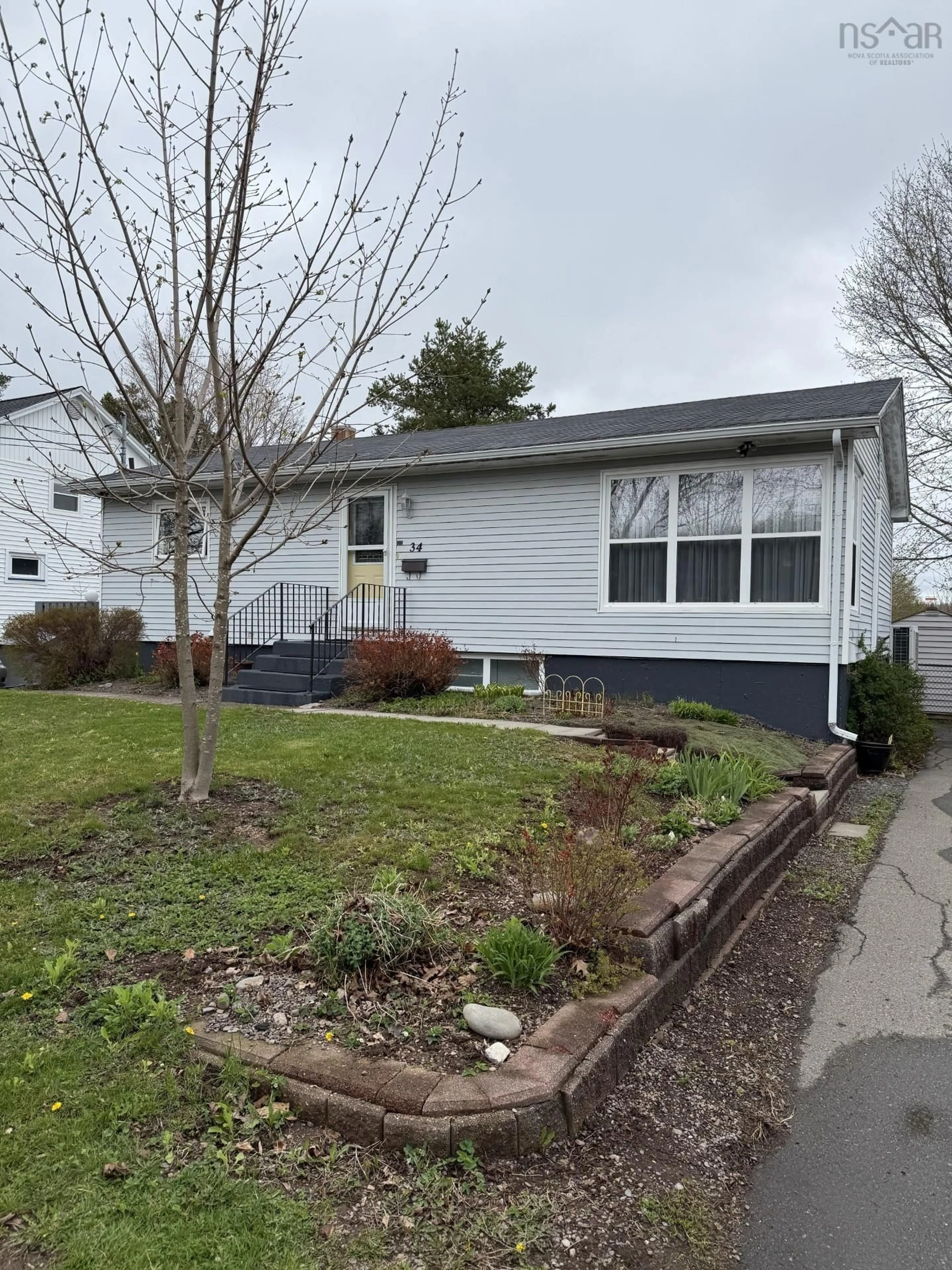 Home with vinyl exterior material, street for 34 Arbor Dr, Antigonish Nova Scotia B2G 1S7