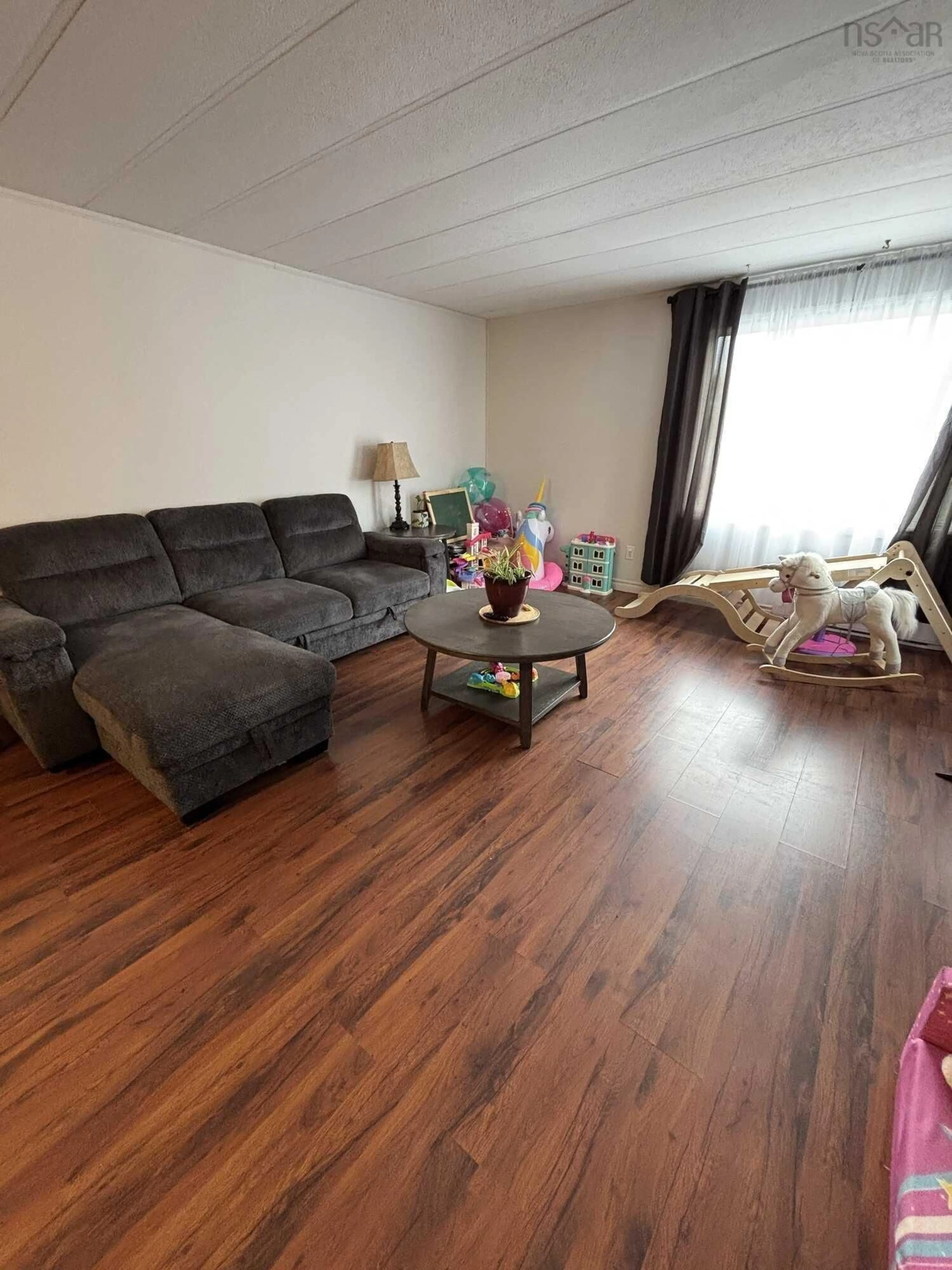 Living room with furniture, unknown for 39 Spring Cres, Bridgewater Nova Scotia B4V 3G3