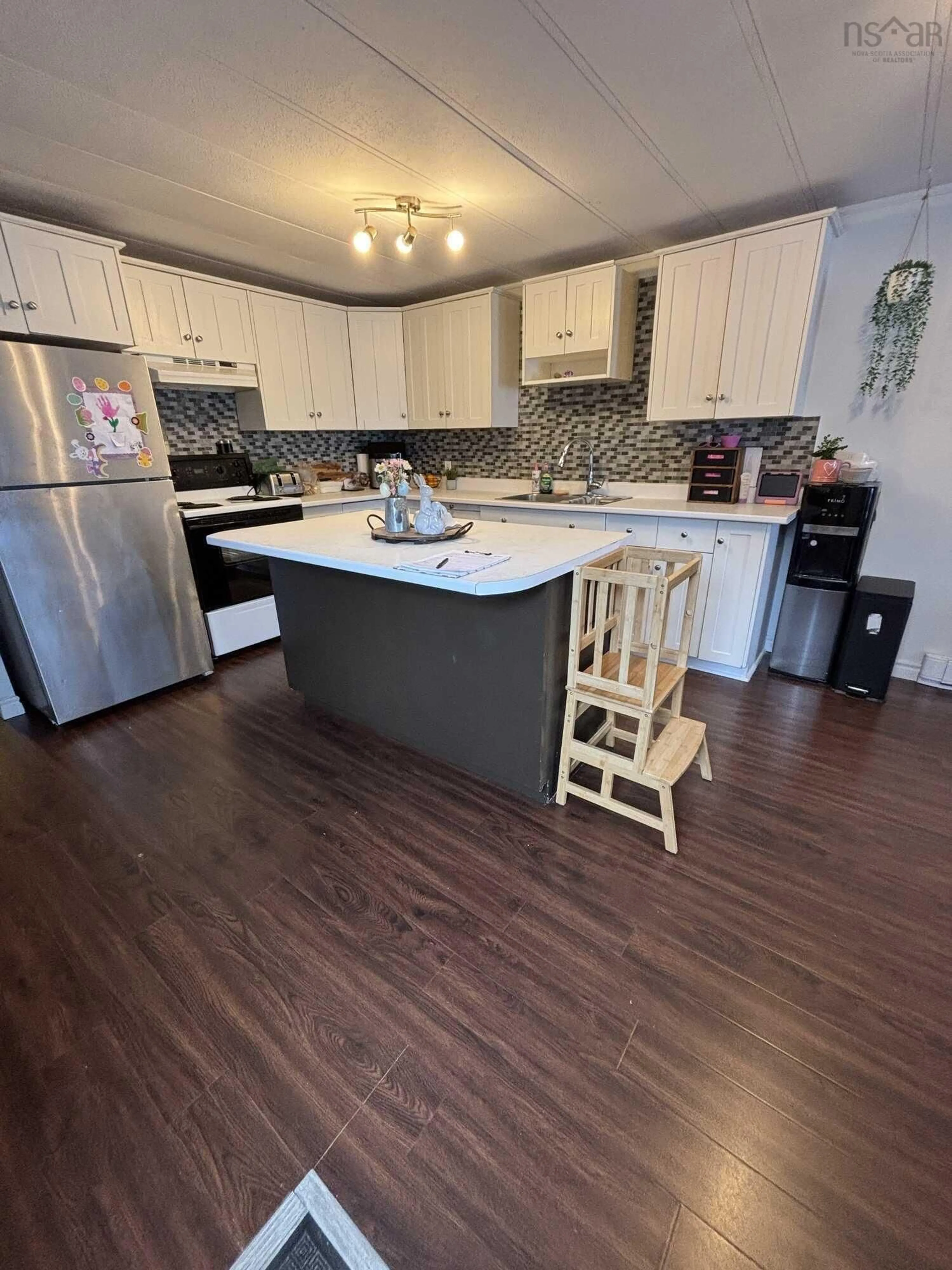 Open concept kitchen, wood/laminate floor for 39 Spring Cres, Bridgewater Nova Scotia B4V 3G3