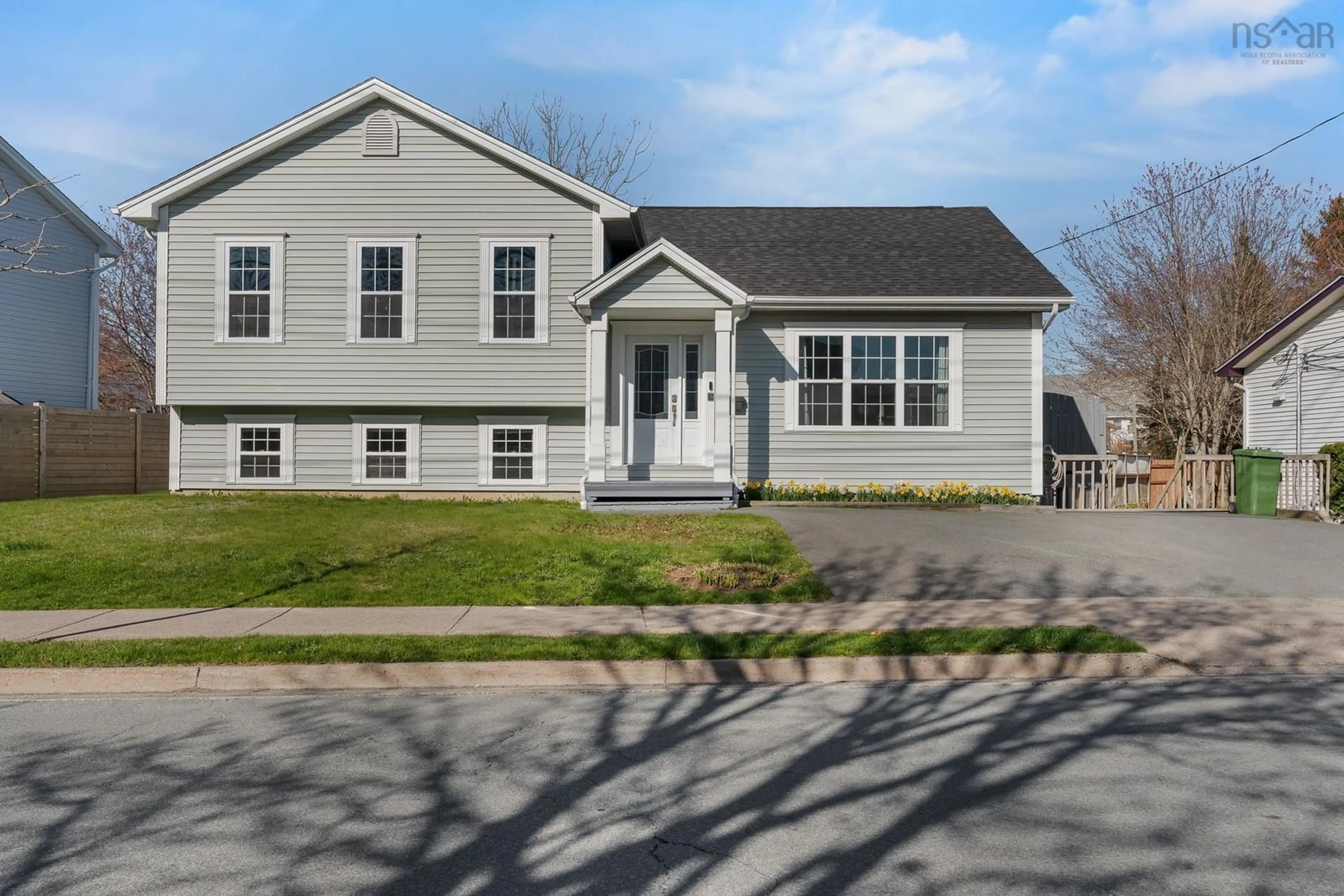 Home with vinyl exterior material, street for 63 Tamarack Dr, Spryfield Nova Scotia B3N 3G5