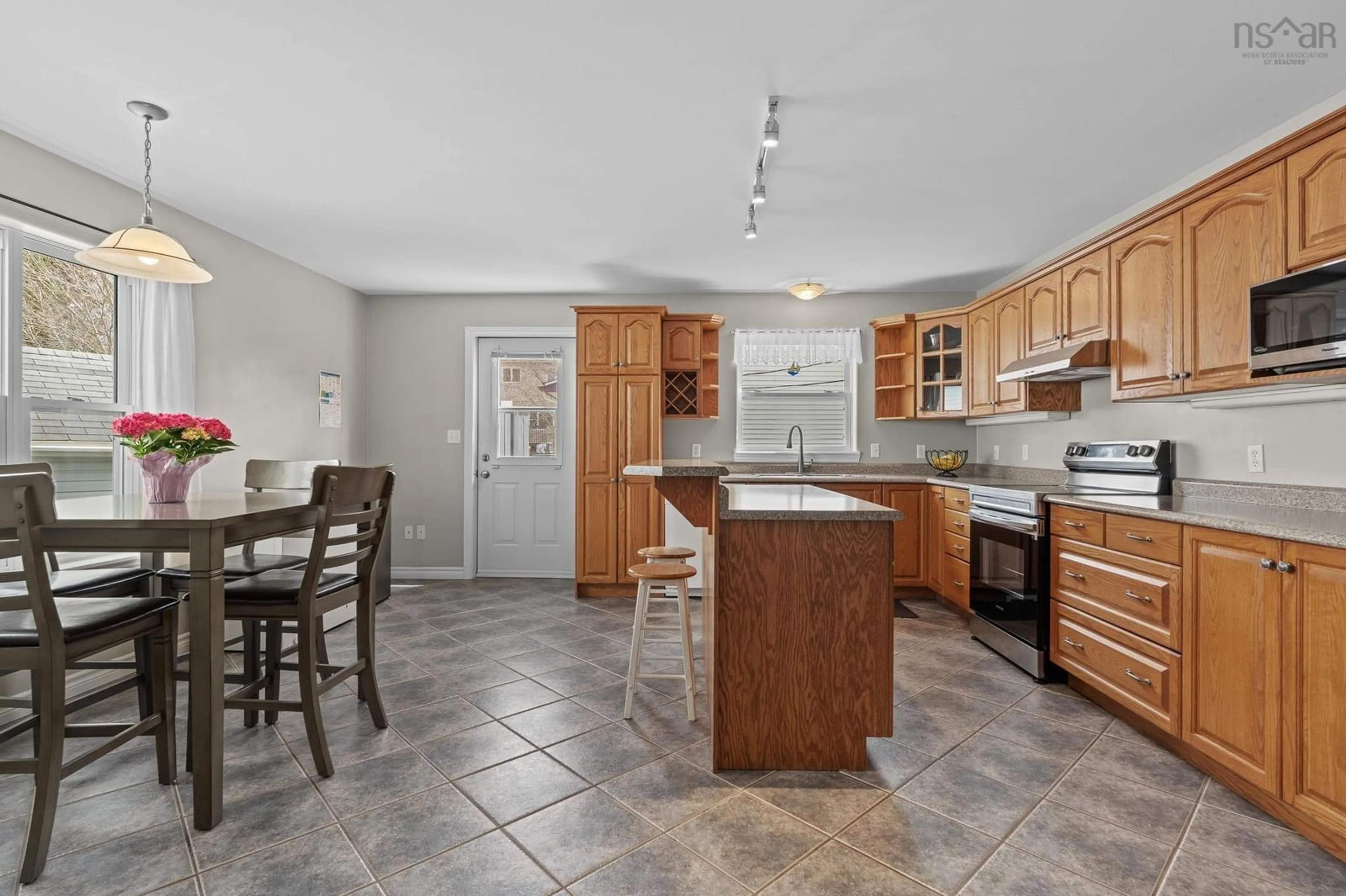 Open concept kitchen, ceramic/tile floor for 63 Tamarack Dr, Spryfield Nova Scotia B3N 3G5