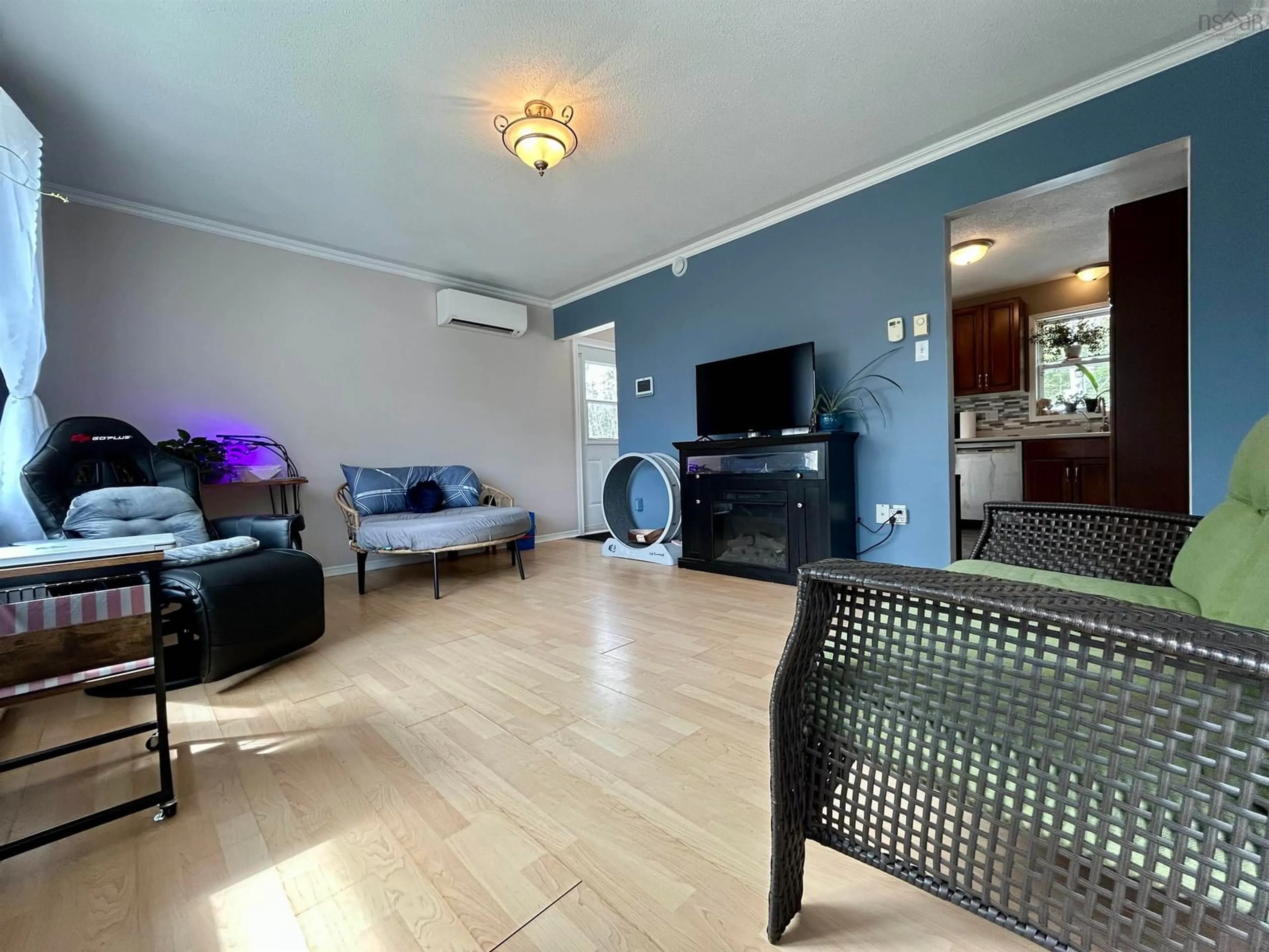 Living room with furniture, wood/laminate floor for 495 Loch Broom Loop, Loch Broom Loop Nova Scotia B0K 2A0
