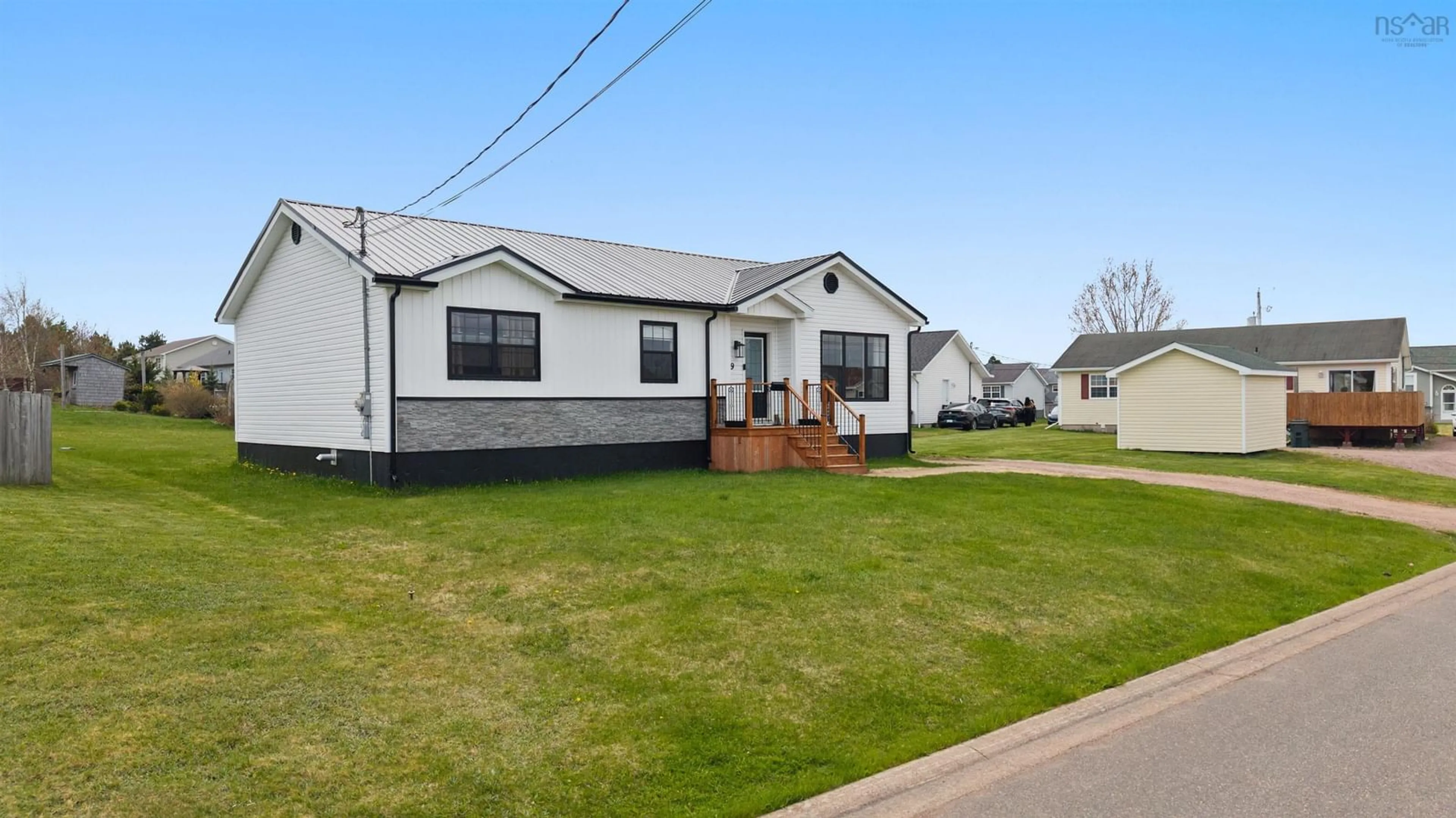 Home with vinyl exterior material, street for 9 Webster St, Amherst Nova Scotia B4H 0A6