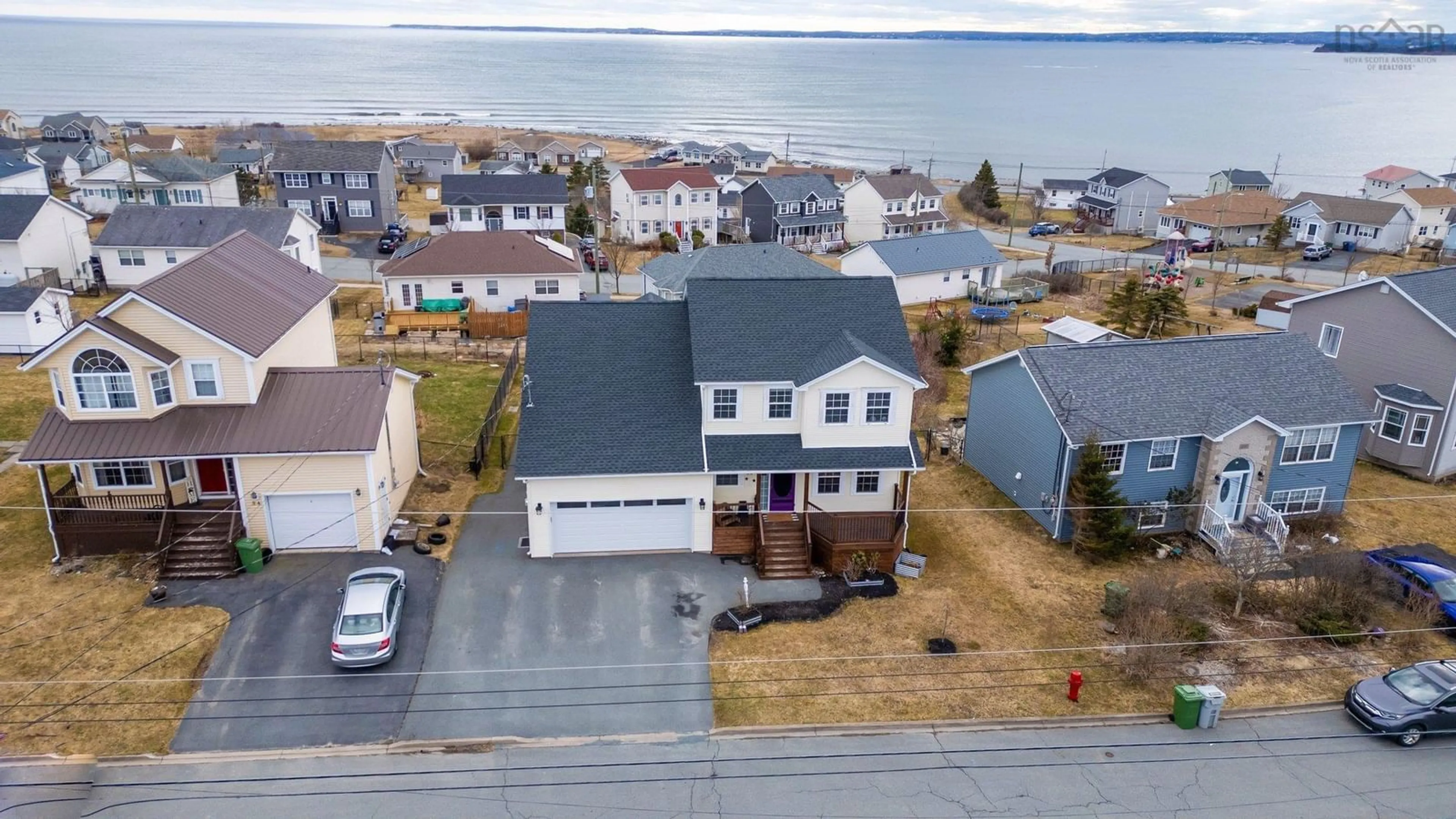 A pic from outside/outdoor area/front of a property/back of a property/a pic from drone, water/lake/river/ocean view for 60 Sea Spray Dr, Eastern Passage Nova Scotia B3G 1S6