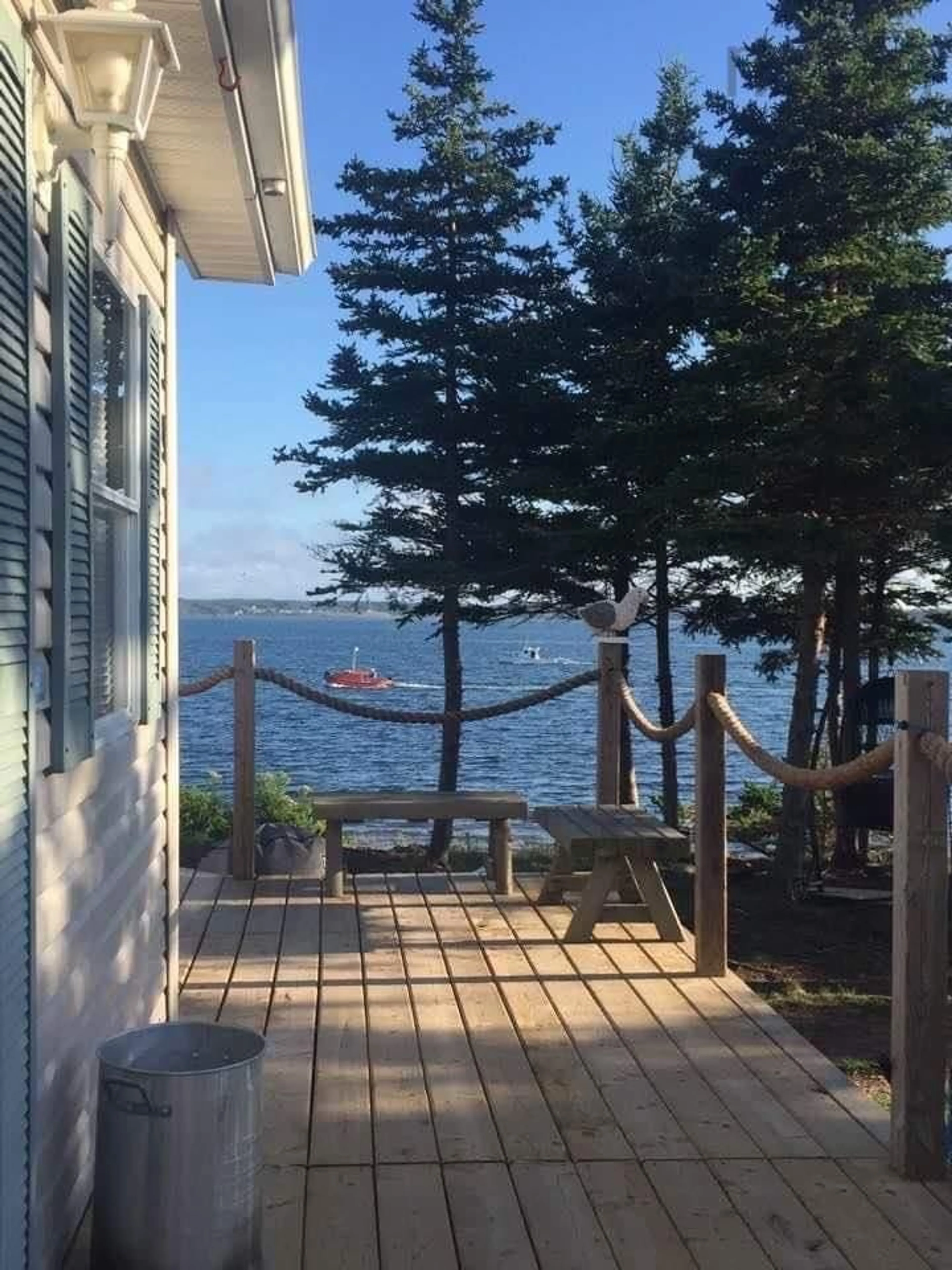 Patio, water/lake/river/ocean view for 85 Mariner Dr, River Bourgeois Nova Scotia B0E 2X0