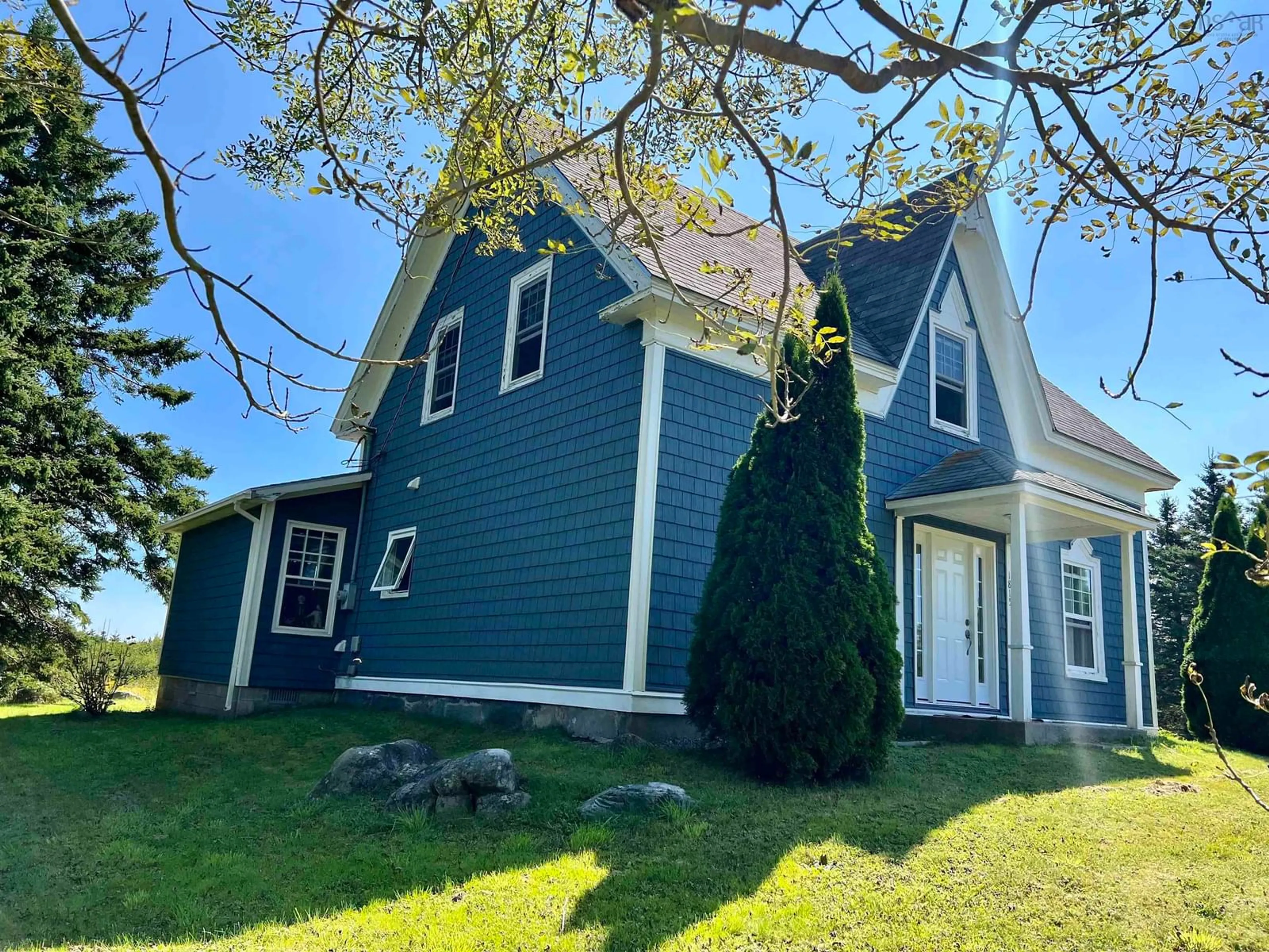 Home with vinyl exterior material, street for 1815 West Sable Rd, Sable River Nova Scotia B0T 1V0