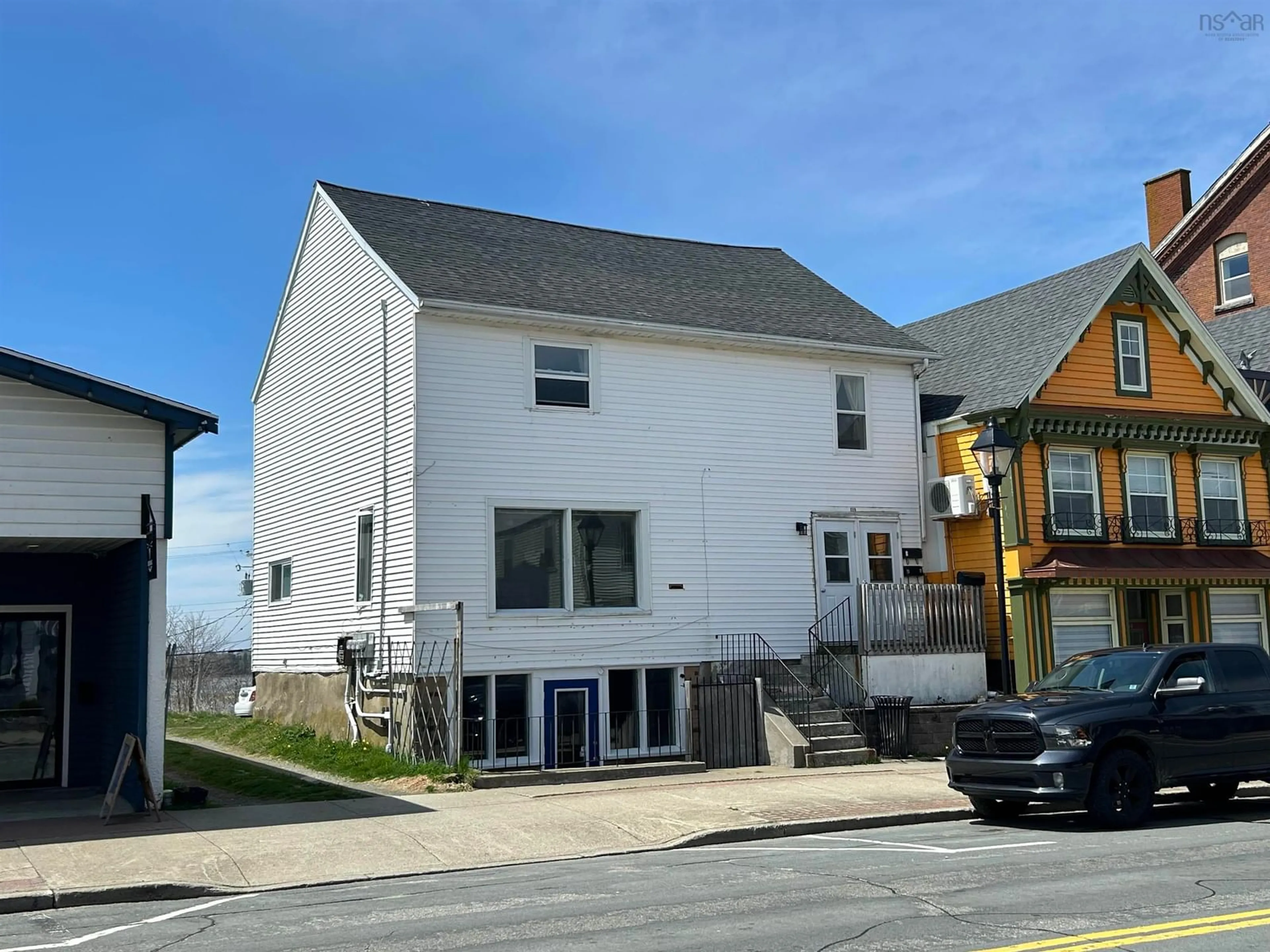 A pic from outside/outdoor area/front of a property/back of a property/a pic from drone, street for 256 Main St, Yarmouth Nova Scotia B5A 1C9