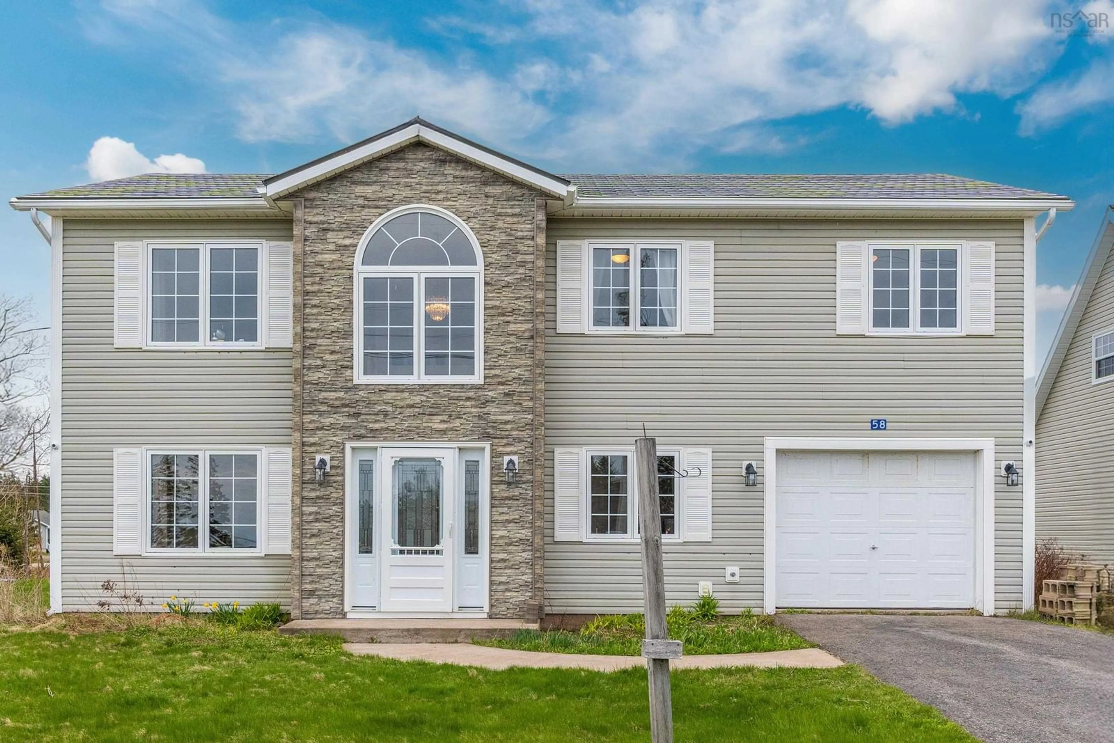 Home with vinyl exterior material, street for 58 Dimock Road, Margaretsville Nova Scotia B0S 1N0