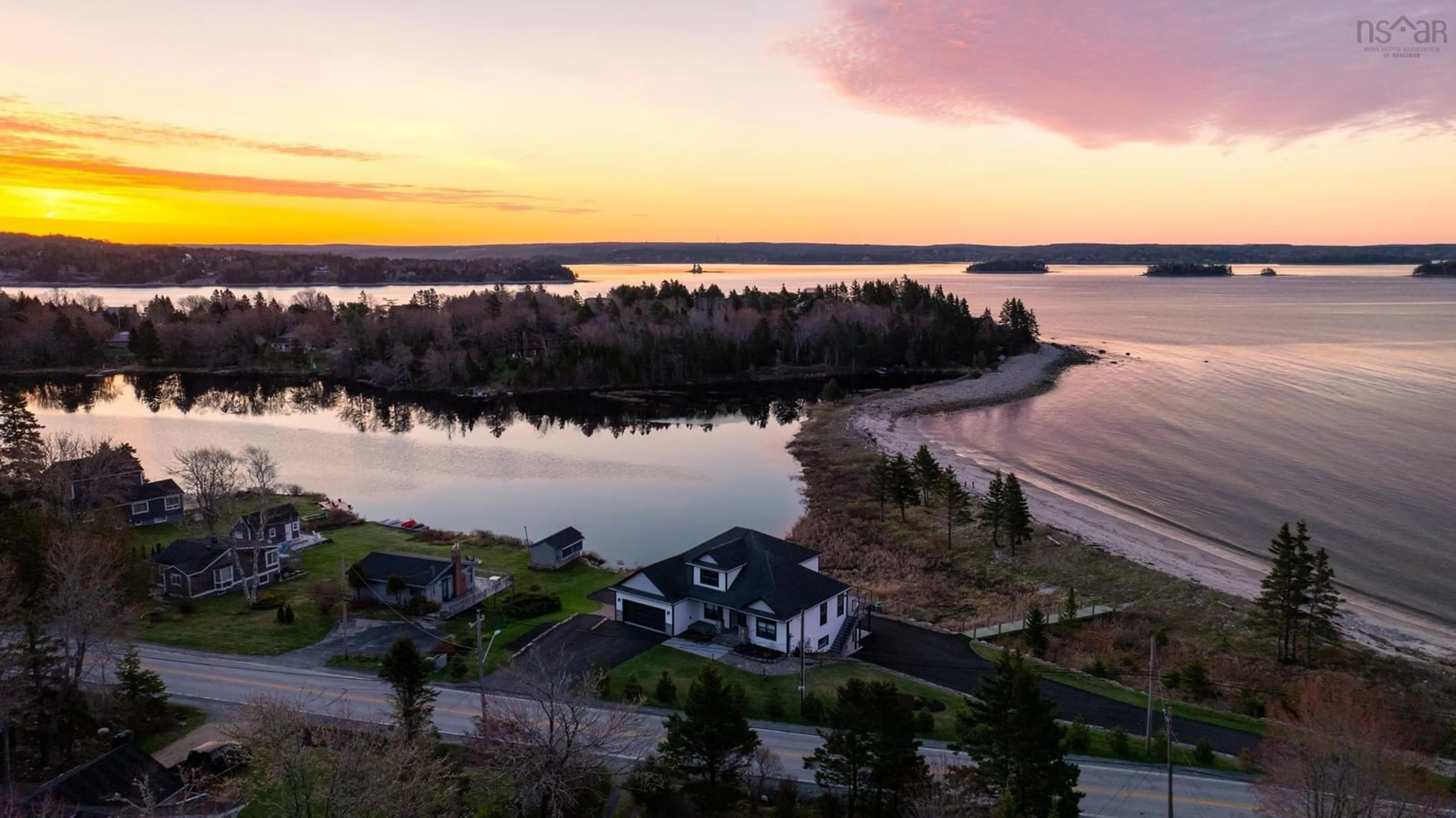 A pic from outside/outdoor area/front of a property/back of a property/a pic from drone, water/lake/river/ocean view for 8286 St. Margarets Bay Rd, Black Point Nova Scotia B0J 1B0