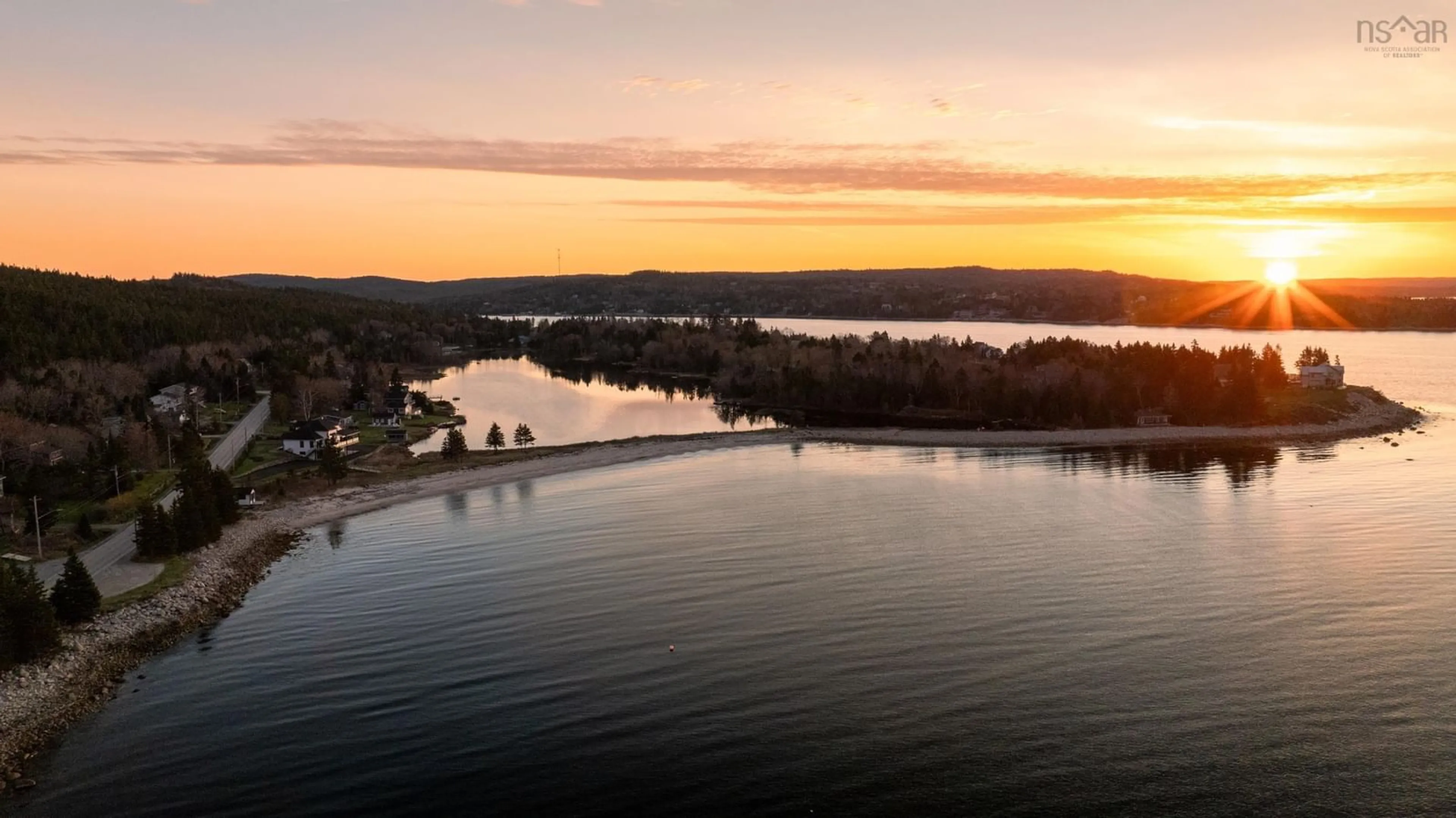 A pic from outside/outdoor area/front of a property/back of a property/a pic from drone, water/lake/river/ocean view for 8286 St. Margarets Bay Rd, Black Point Nova Scotia B0J 1B0