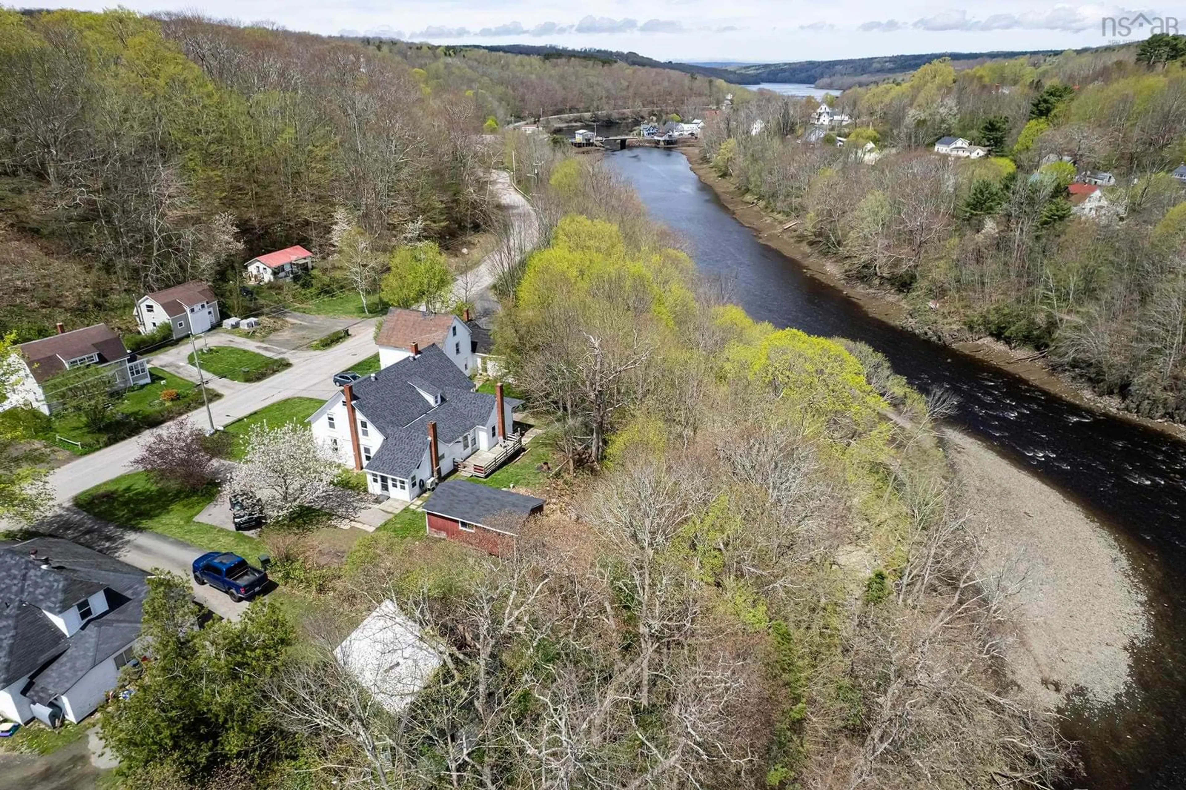 A pic from outside/outdoor area/front of a property/back of a property/a pic from drone, water/lake/river/ocean view for 1361 River Rd, Bear River Nova Scotia B0S 1B0