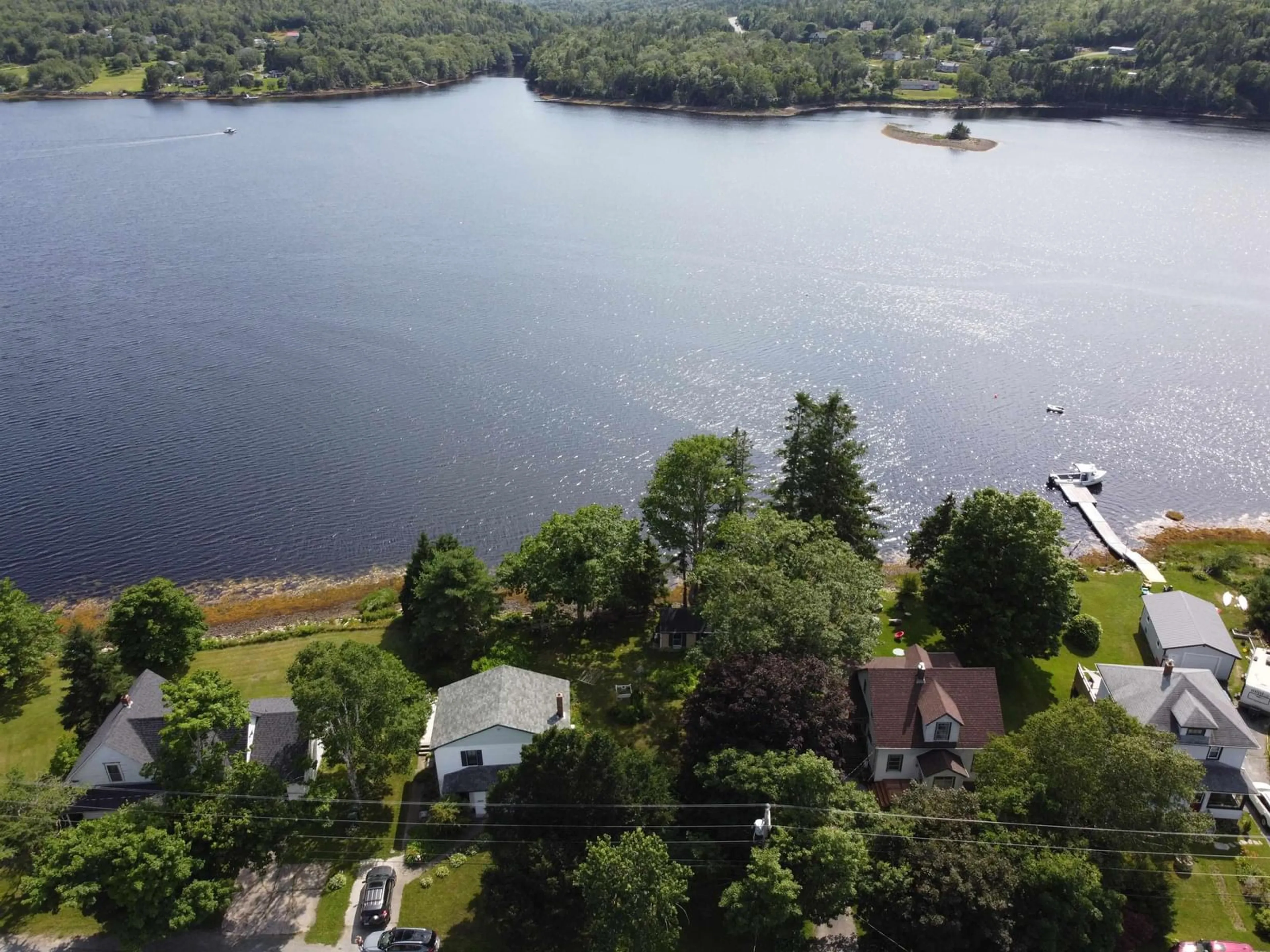 A pic from outside/outdoor area/front of a property/back of a property/a pic from drone, water/lake/river/ocean view for 22676 Highway 7, Sheet Harbour Nova Scotia B0J 3B0