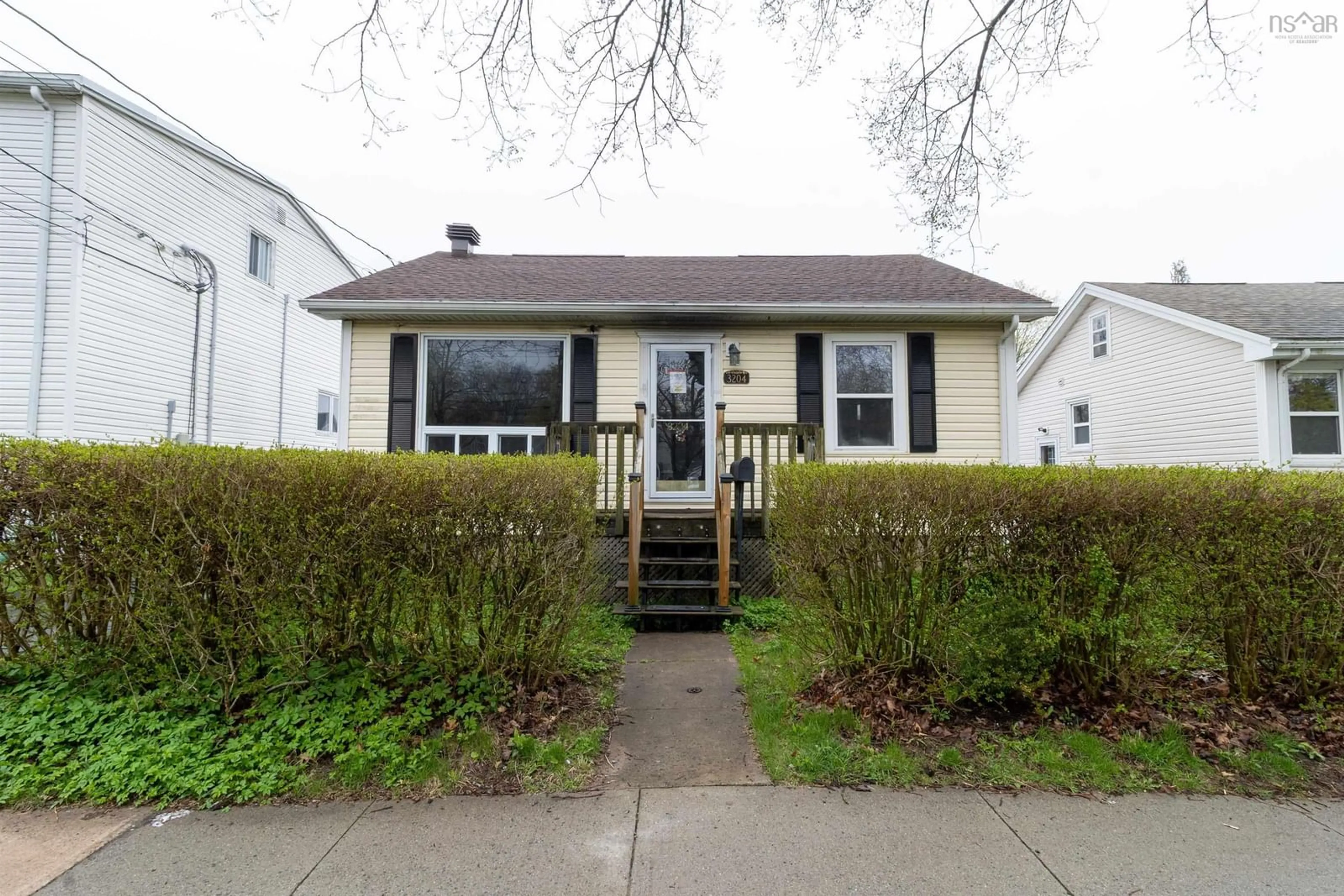 Home with vinyl exterior material, street for 3204 Connaught Ave, Halifax Nova Scotia B3L 3B3