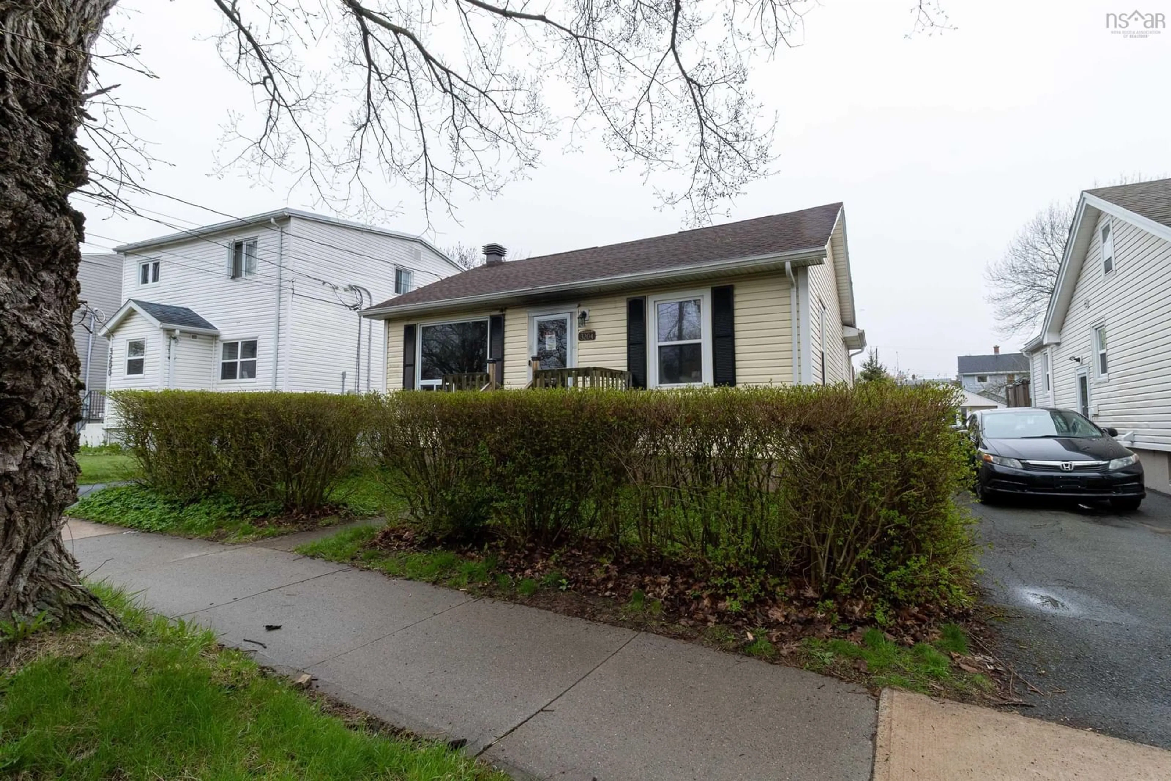 Home with vinyl exterior material, street for 3204 Connaught Ave, Halifax Nova Scotia B3L 3B3
