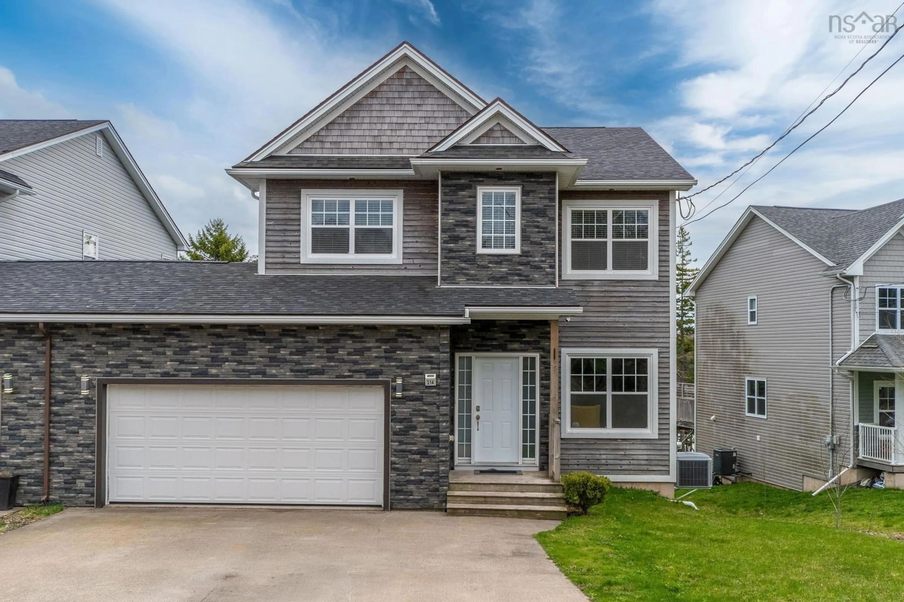 Home with vinyl exterior material, street for 214 Voyageur Way, Hammonds Plains Nova Scotia B4B 0N1