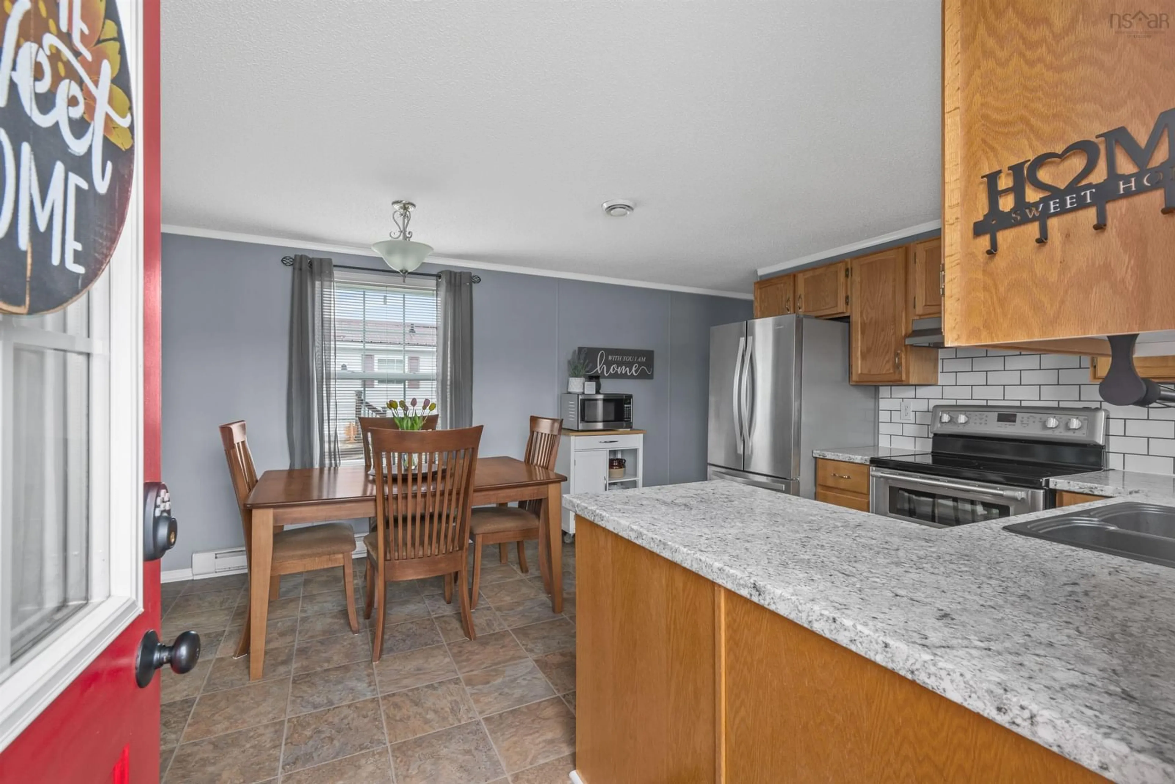 Open concept kitchen, ceramic/tile floor for 68 Bumpy Lane, Lake Echo Nova Scotia B3E 1B8