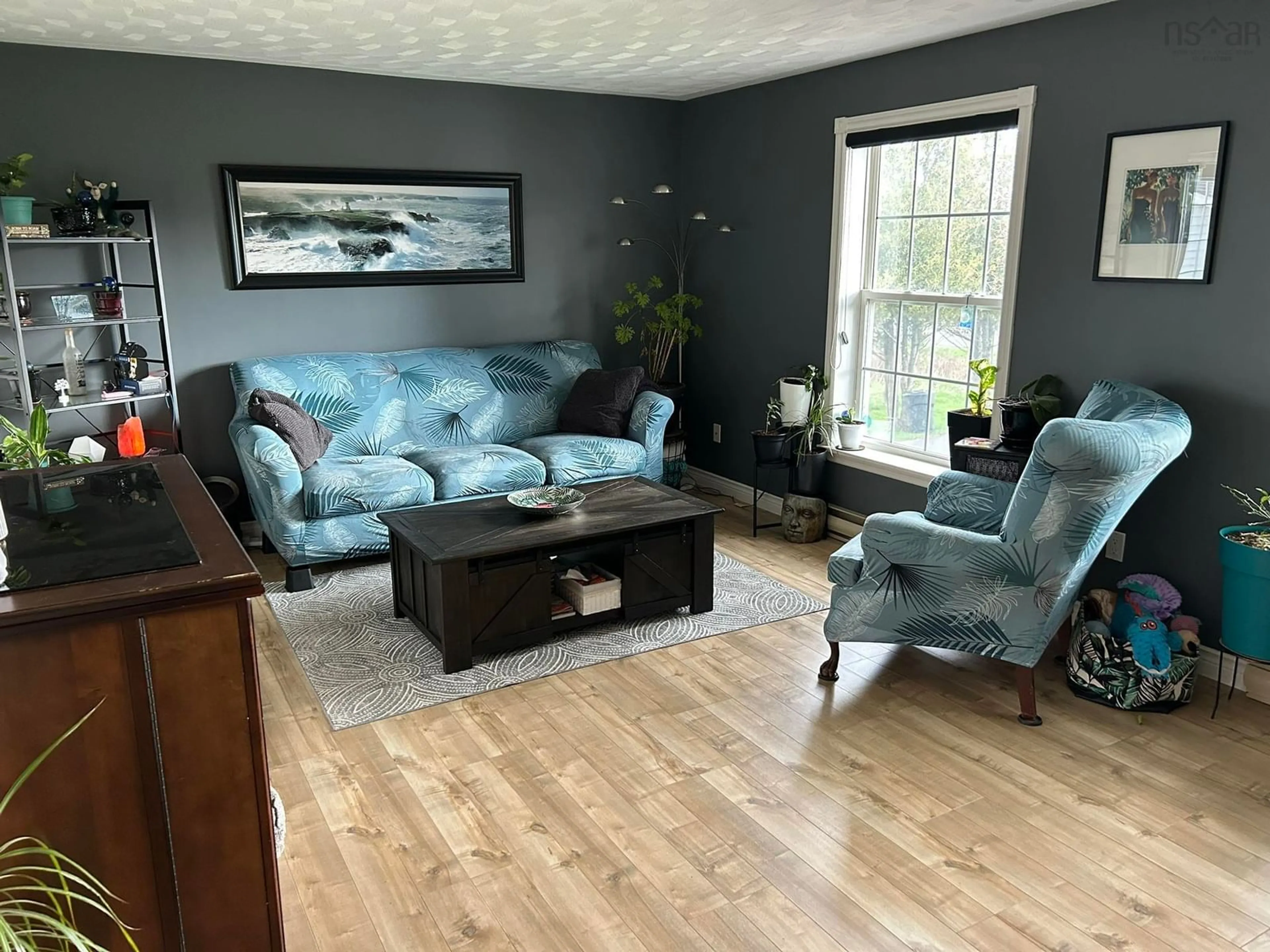 Living room with furniture, wood/laminate floor for 205 Old Court House Branch Rd, Valley Nova Scotia B6L 3X4