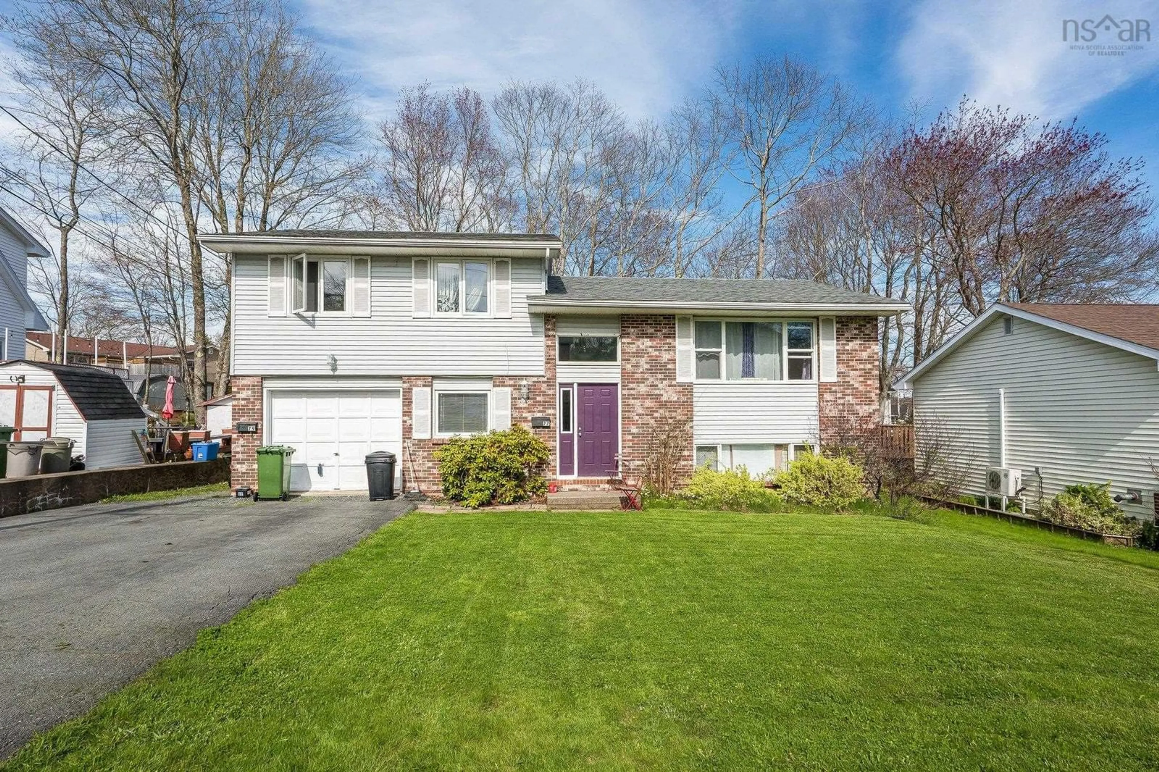 Home with vinyl exterior material, street for 77 Wynn Castle Dr, Lower Sackville Nova Scotia B4E 2R6